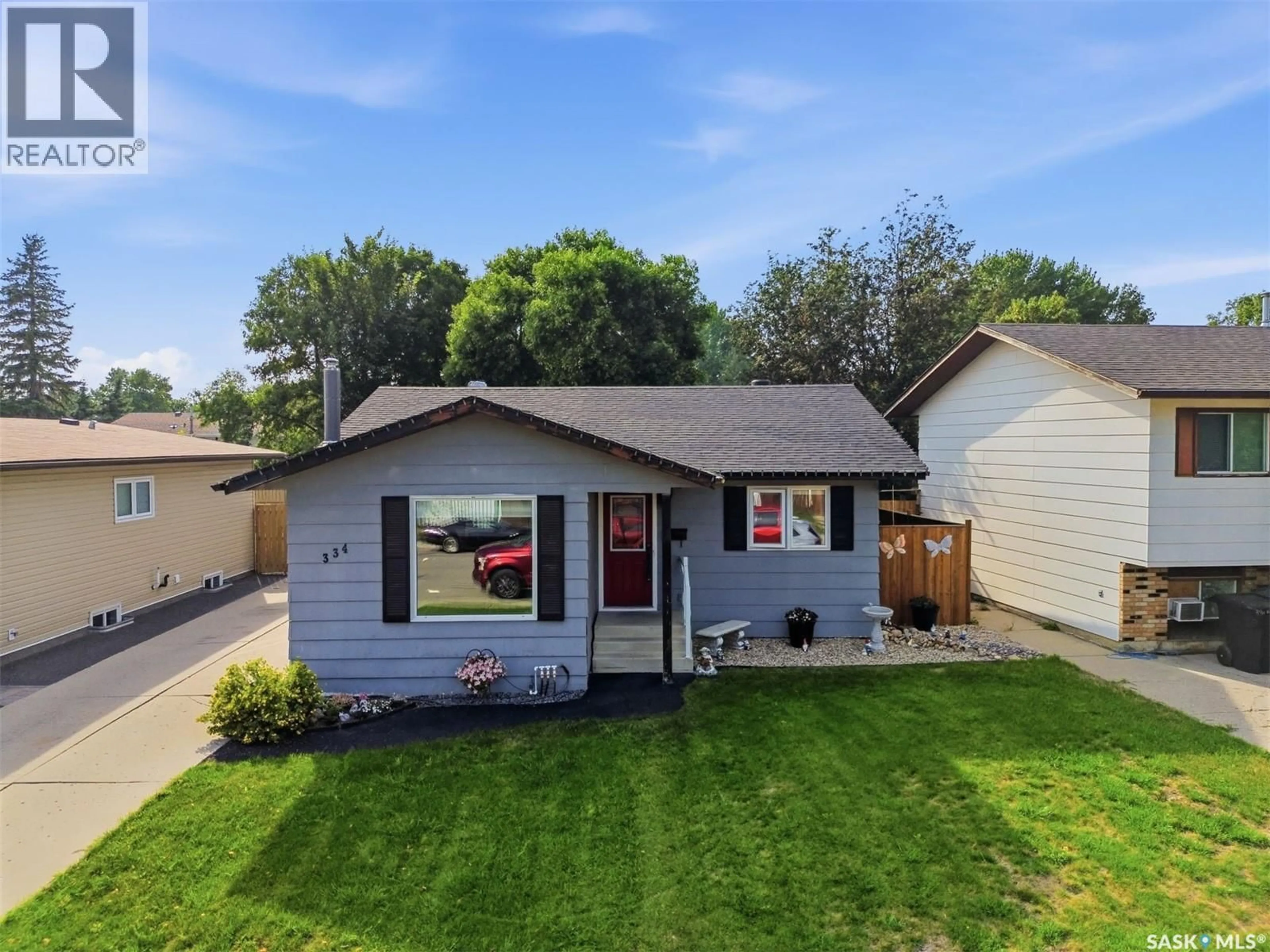 Home with vinyl exterior material, street for 334 NEEDHAM CRESCENT, Saskatoon Saskatchewan S7M4X5
