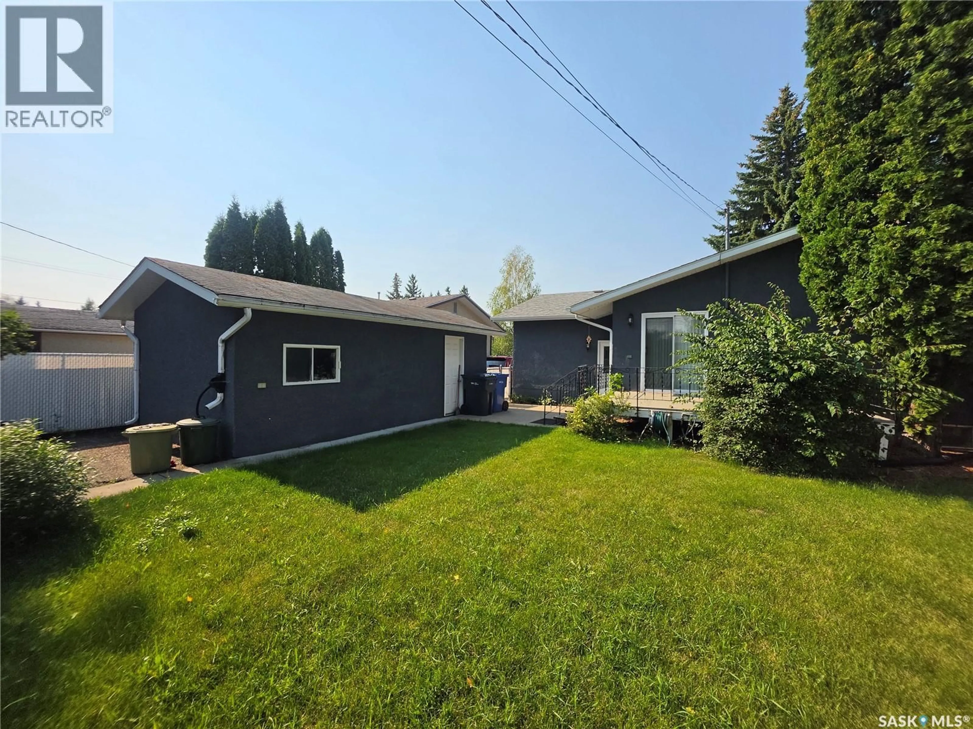 Home with vinyl exterior material, street for 8919 17TH AVENUE, North Battleford Saskatchewan S9A2T8