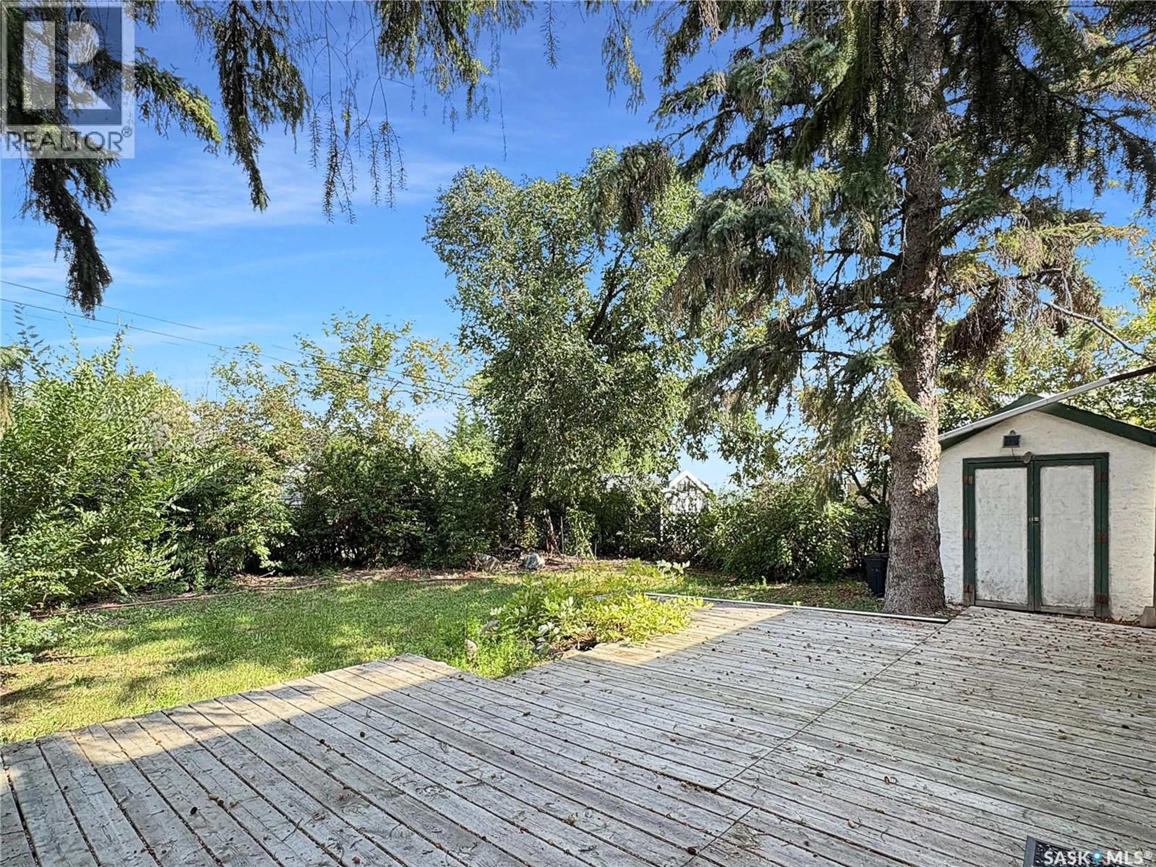 A pic from outside/outdoor area/front of a property/back of a property/a pic from drone, forest/trees view for 12 22ND STREET, Battleford Saskatchewan S0M0E0