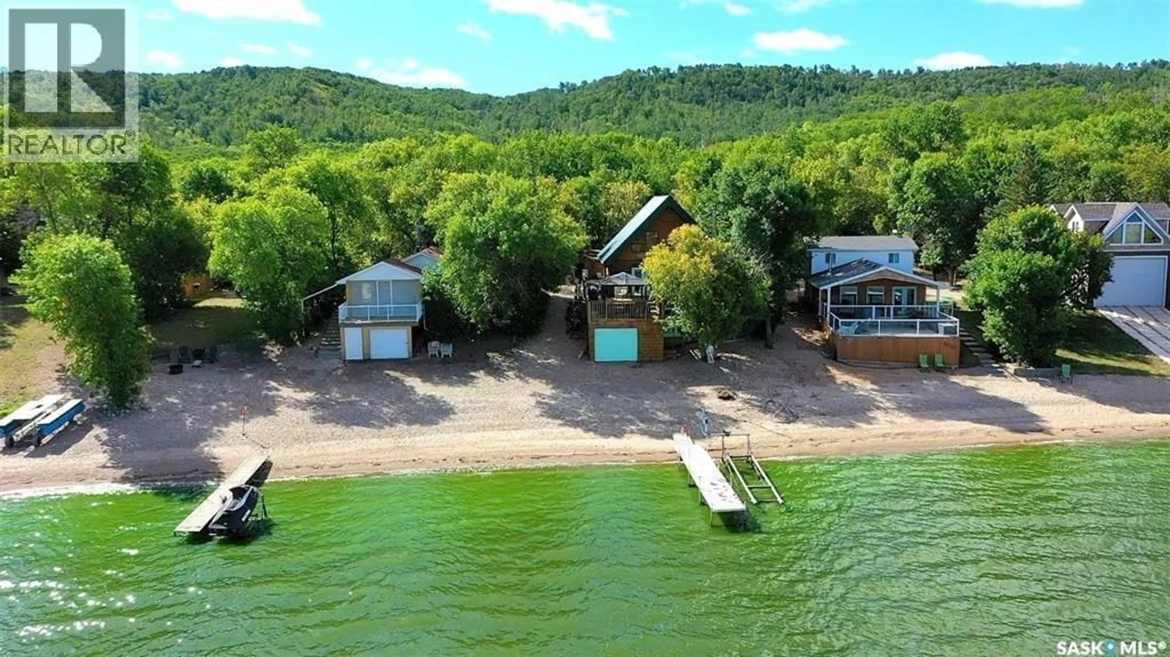 A pic from outside/outdoor area/front of a property/back of a property/a pic from drone, water/lake/river/ocean view for 14 POPLAR TRAIL, Crooked Lake Saskatchewan S0G2B0