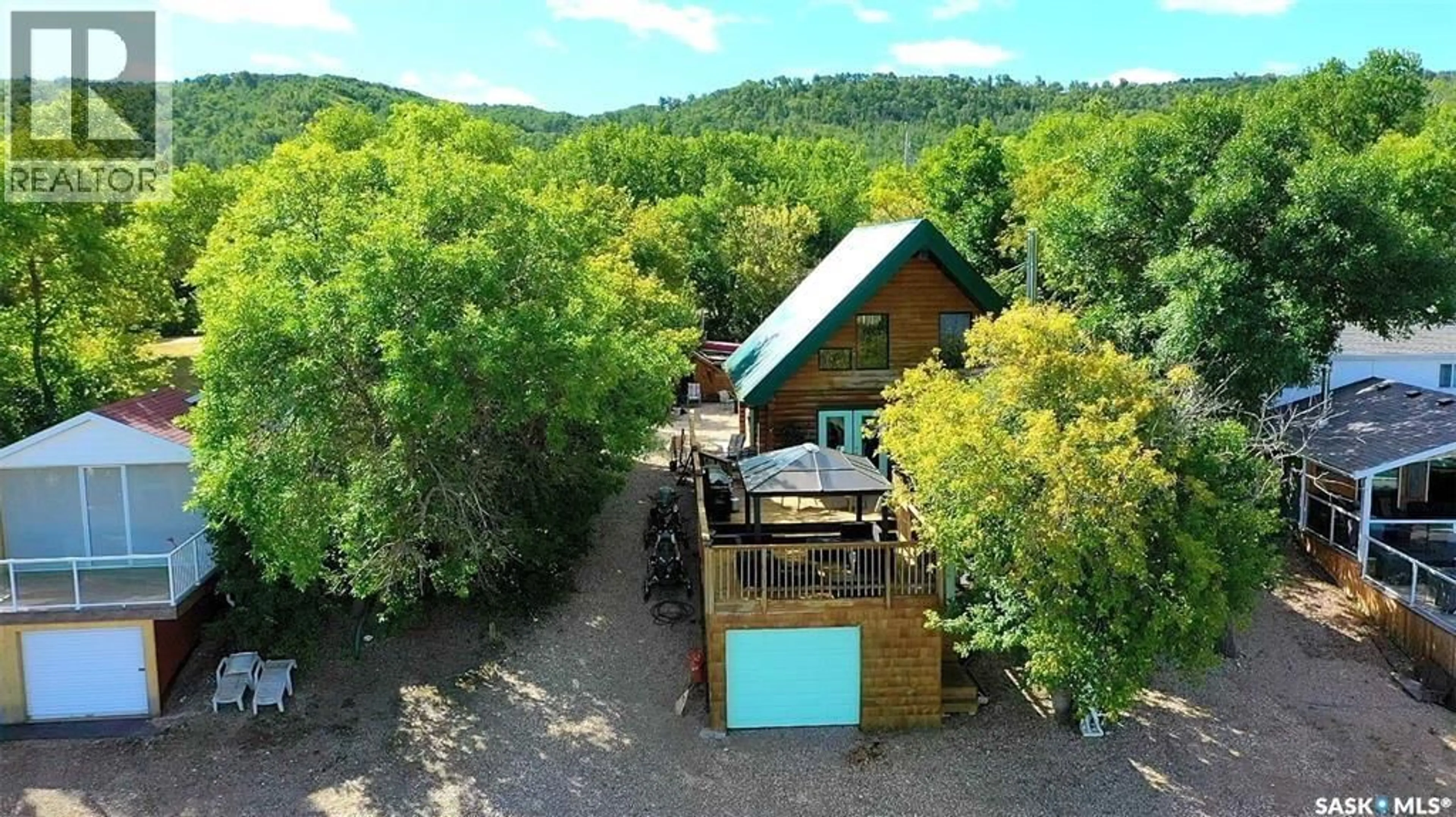 A pic from outside/outdoor area/front of a property/back of a property/a pic from drone, mountain view for 14 POPLAR TRAIL, Crooked Lake Saskatchewan S0G2B0
