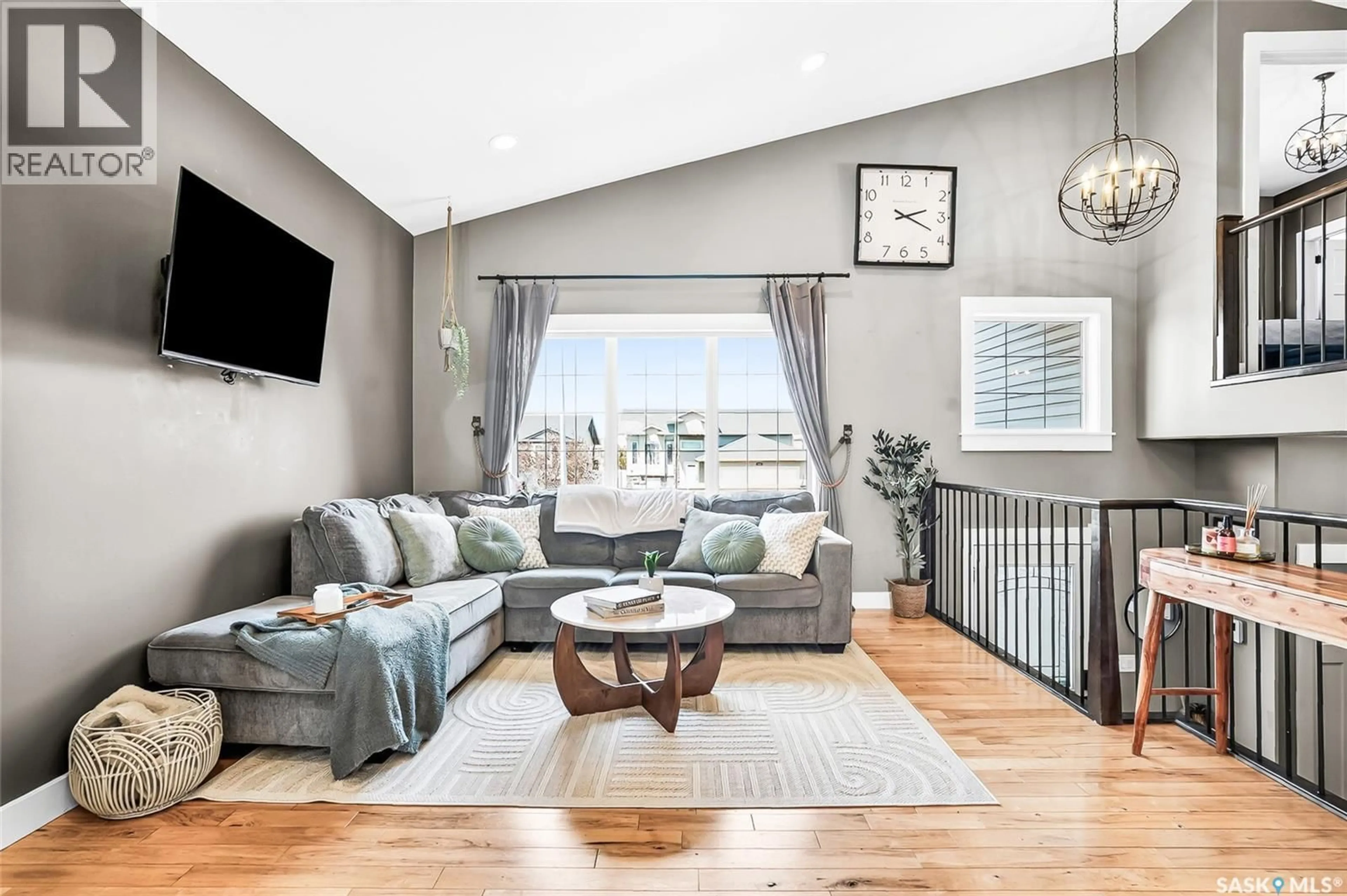 Living room with furniture, unknown for 920 COPPERMINE WAY, Martensville Saskatchewan S0K0A2
