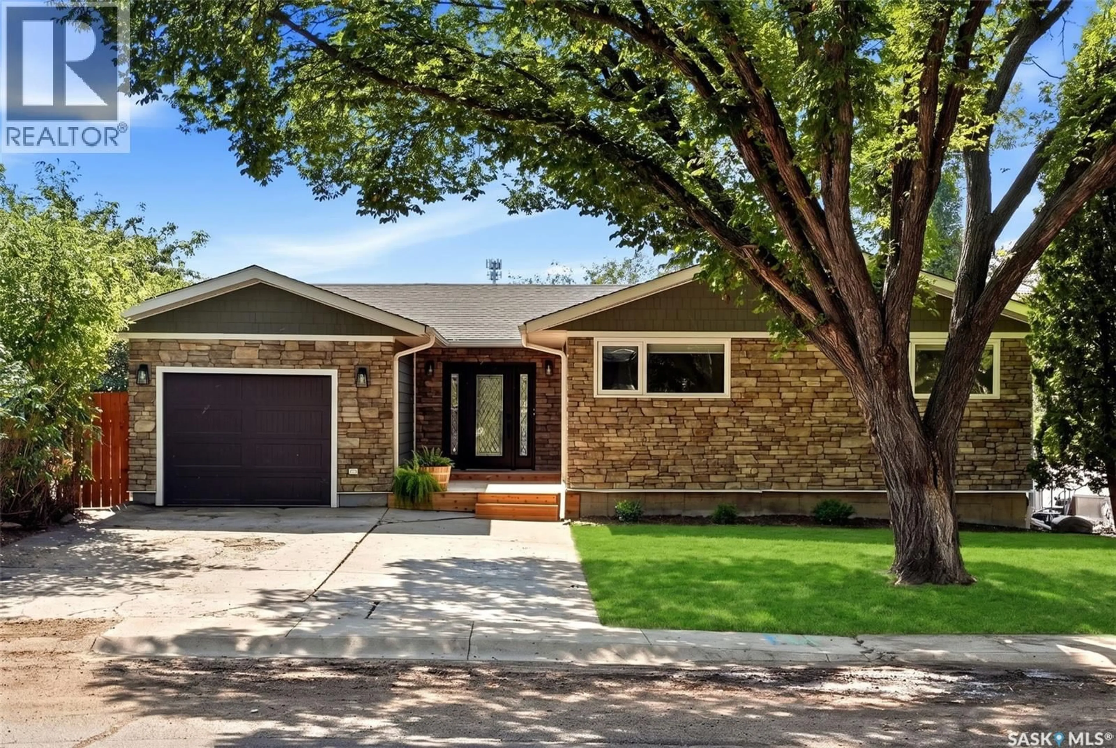 Home with brick exterior material, street for 19 EMPRESS DRIVE, Regina Saskatchewan S4T6M7