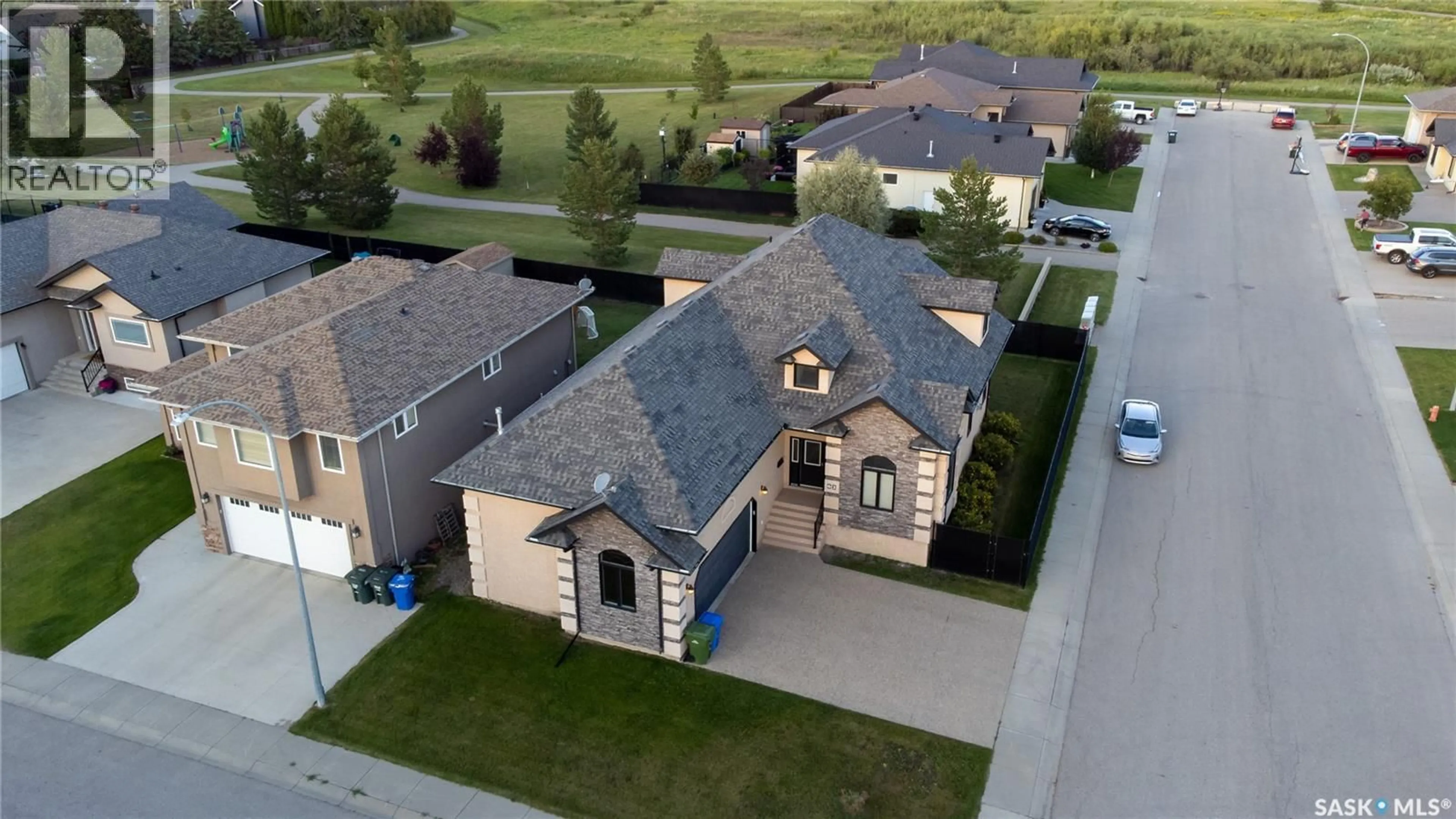 A pic from outside/outdoor area/front of a property/back of a property/a pic from drone, street for 62 GLEN HOWARD WAY, Prince Albert Saskatchewan S6X0A8