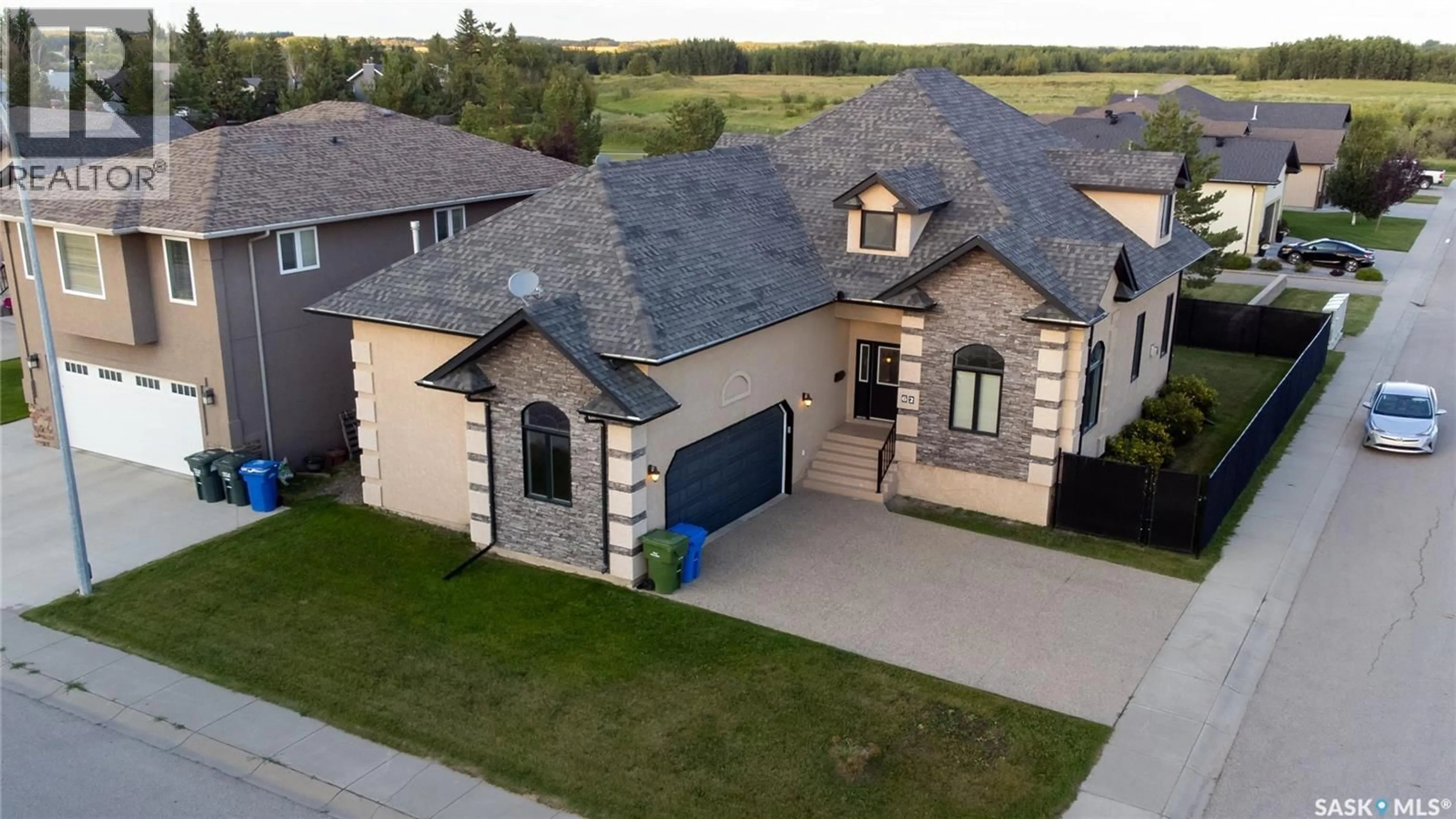 A pic from outside/outdoor area/front of a property/back of a property/a pic from drone, street for 62 GLEN HOWARD WAY, Prince Albert Saskatchewan S6X0A8