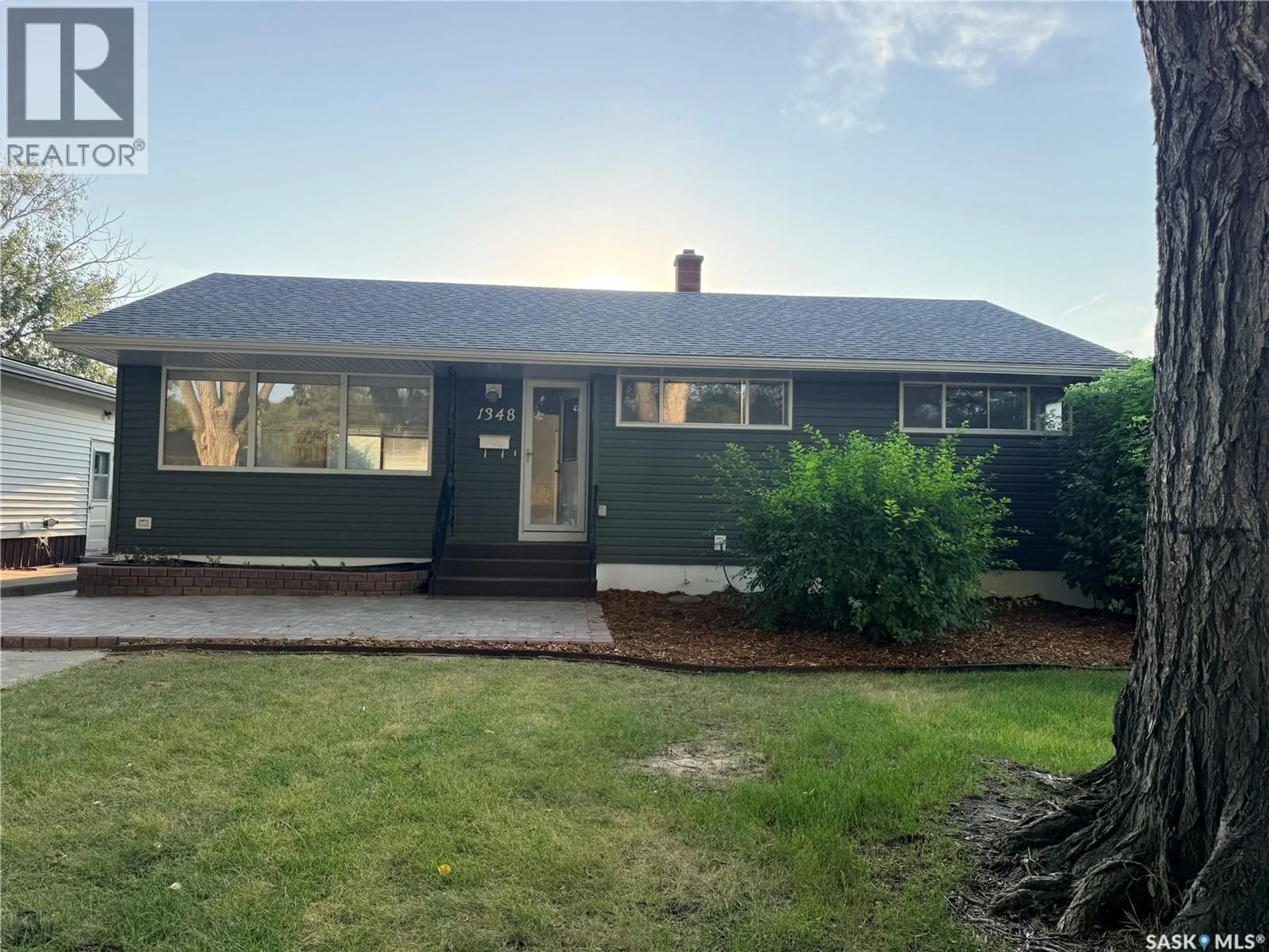 Home with vinyl exterior material, street for 1348 HORACE STREET, Regina Saskatchewan S4T5L6