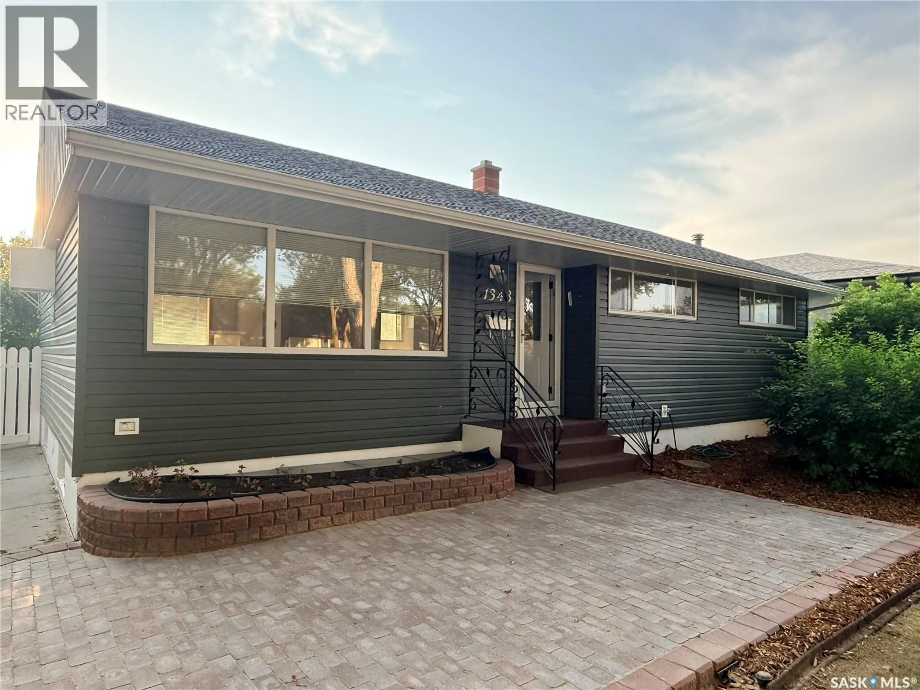 Home with vinyl exterior material, street for 1348 HORACE STREET, Regina Saskatchewan S4T5L6