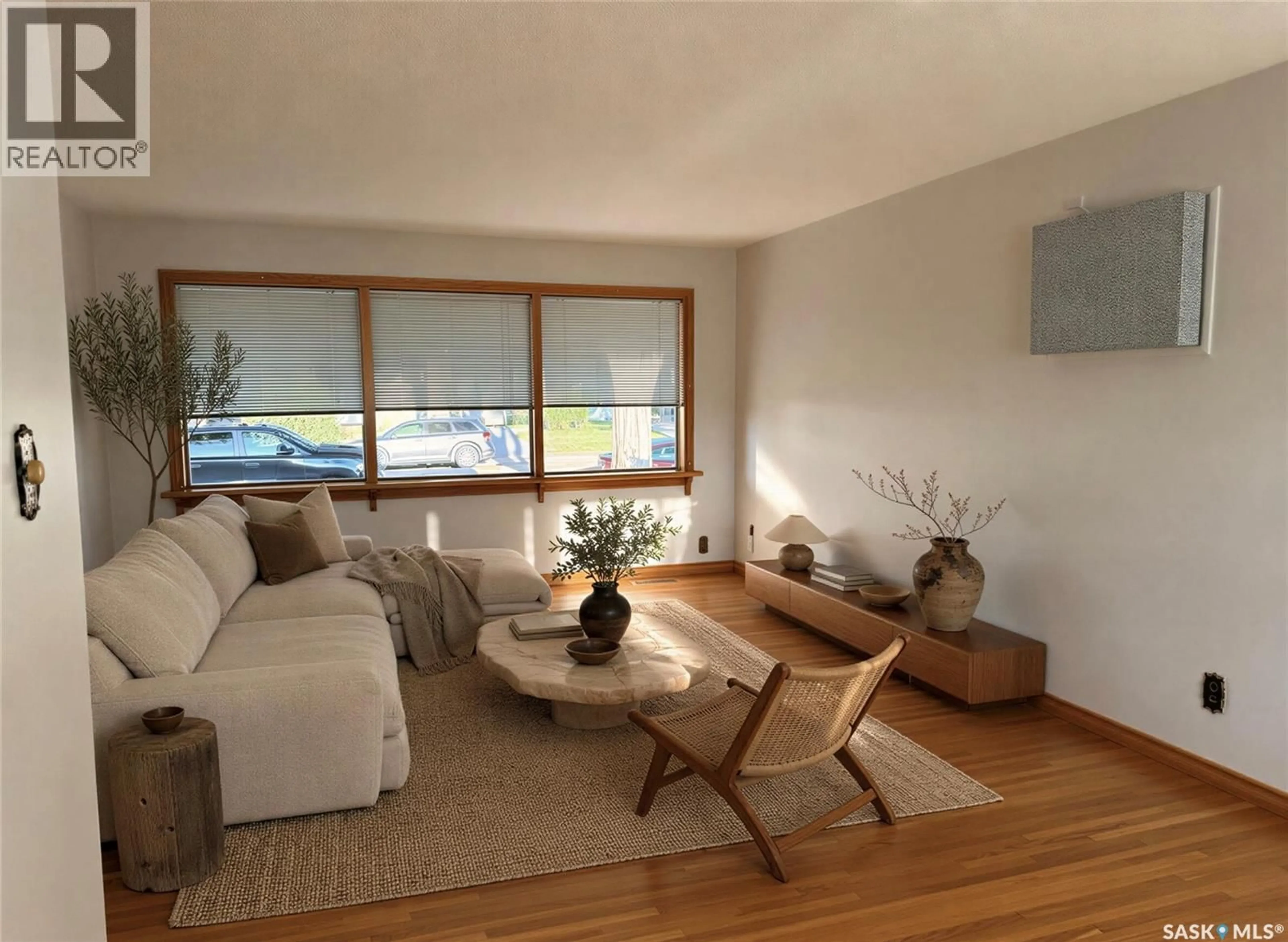 Living room with furniture, wood/laminate floor for 1348 HORACE STREET, Regina Saskatchewan S4T5L6