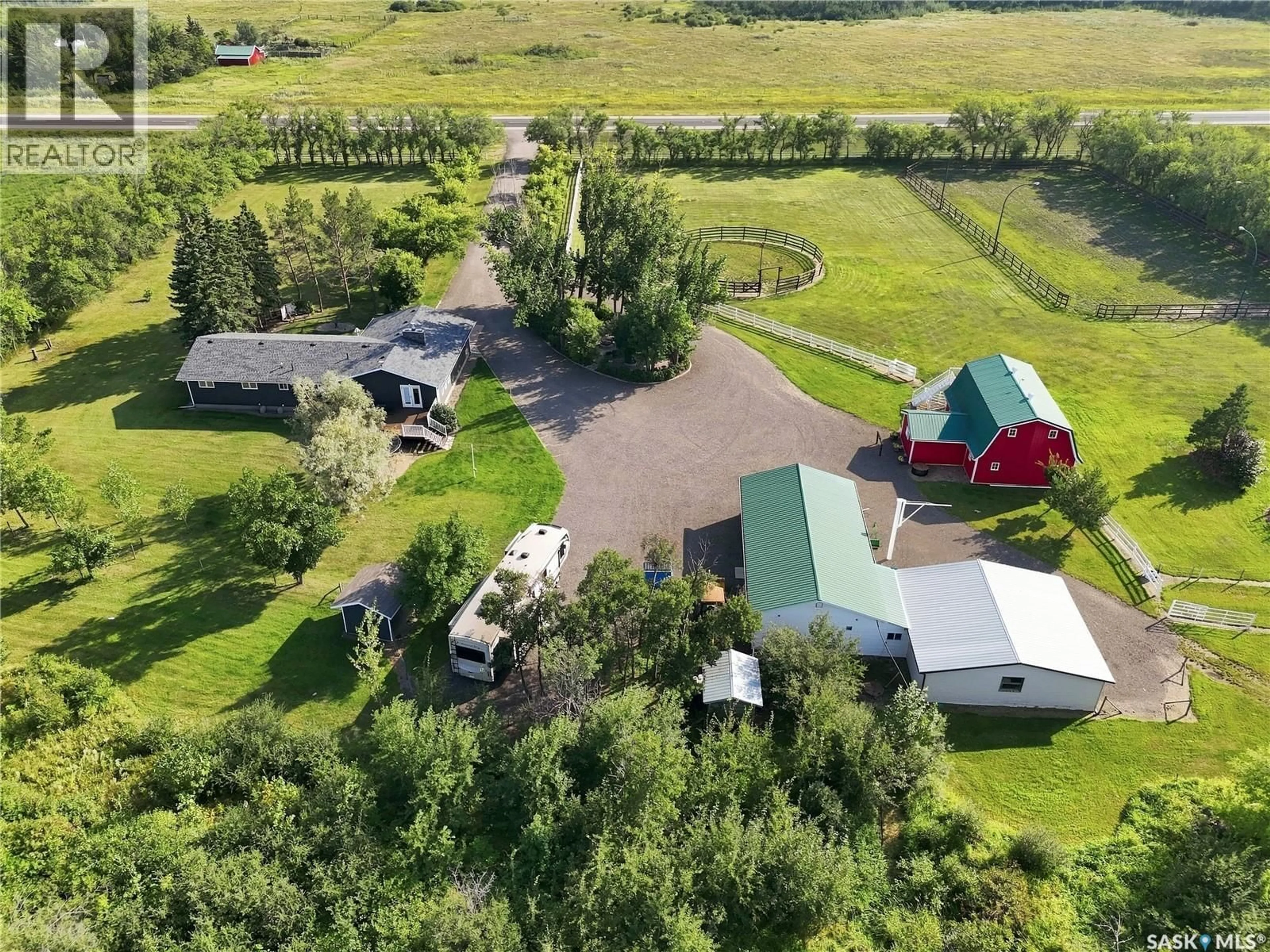 A pic from outside/outdoor area/front of a property/back of a property/a pic from drone, mountain view for PETZ ACREAGE, Corman Park Rm No. 344 Saskatchewan S0K2T0