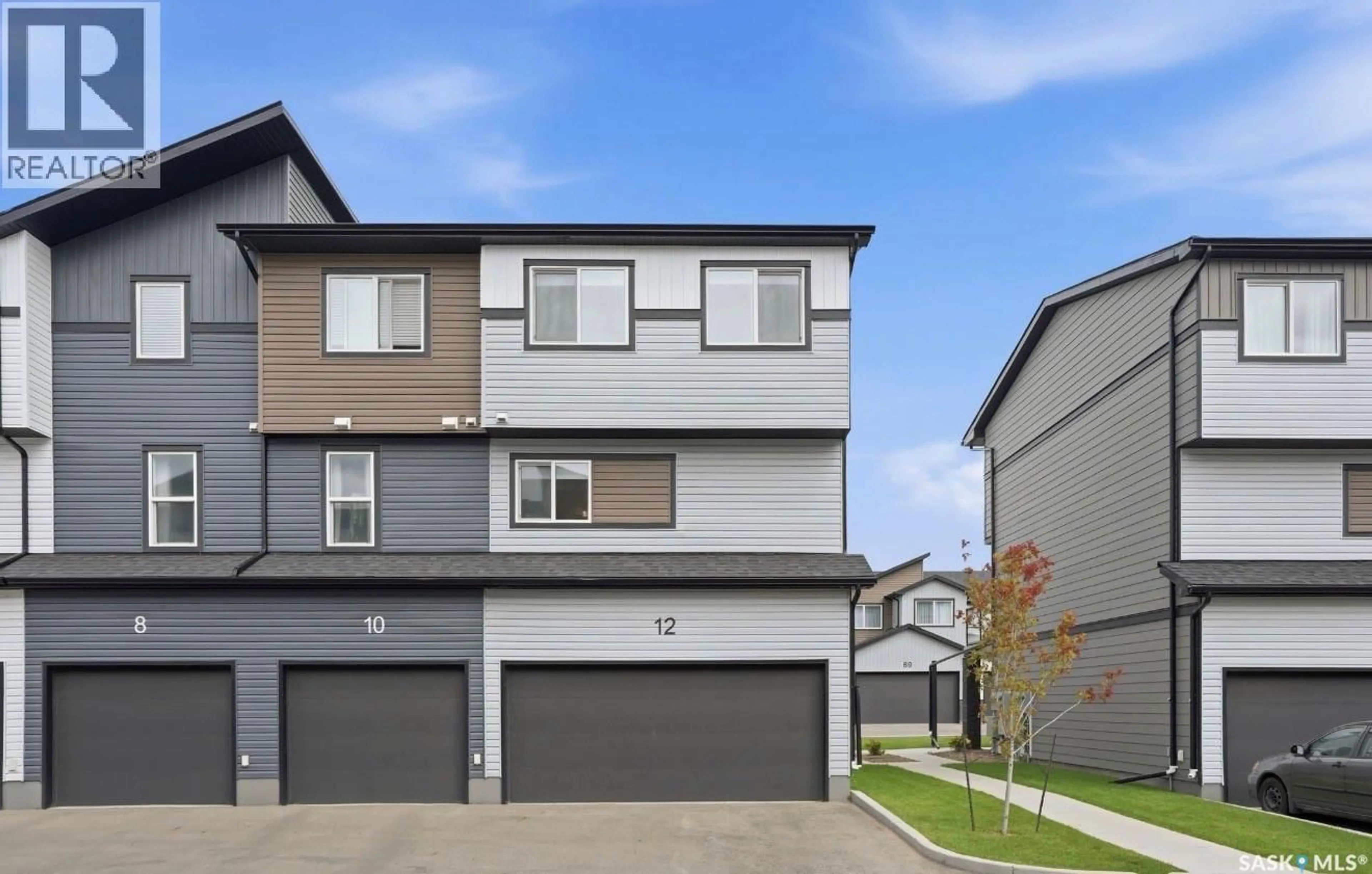 Home with vinyl exterior material, street for 12 651 DUBOIS CRESCENT, Saskatoon Saskatchewan S7V0R3