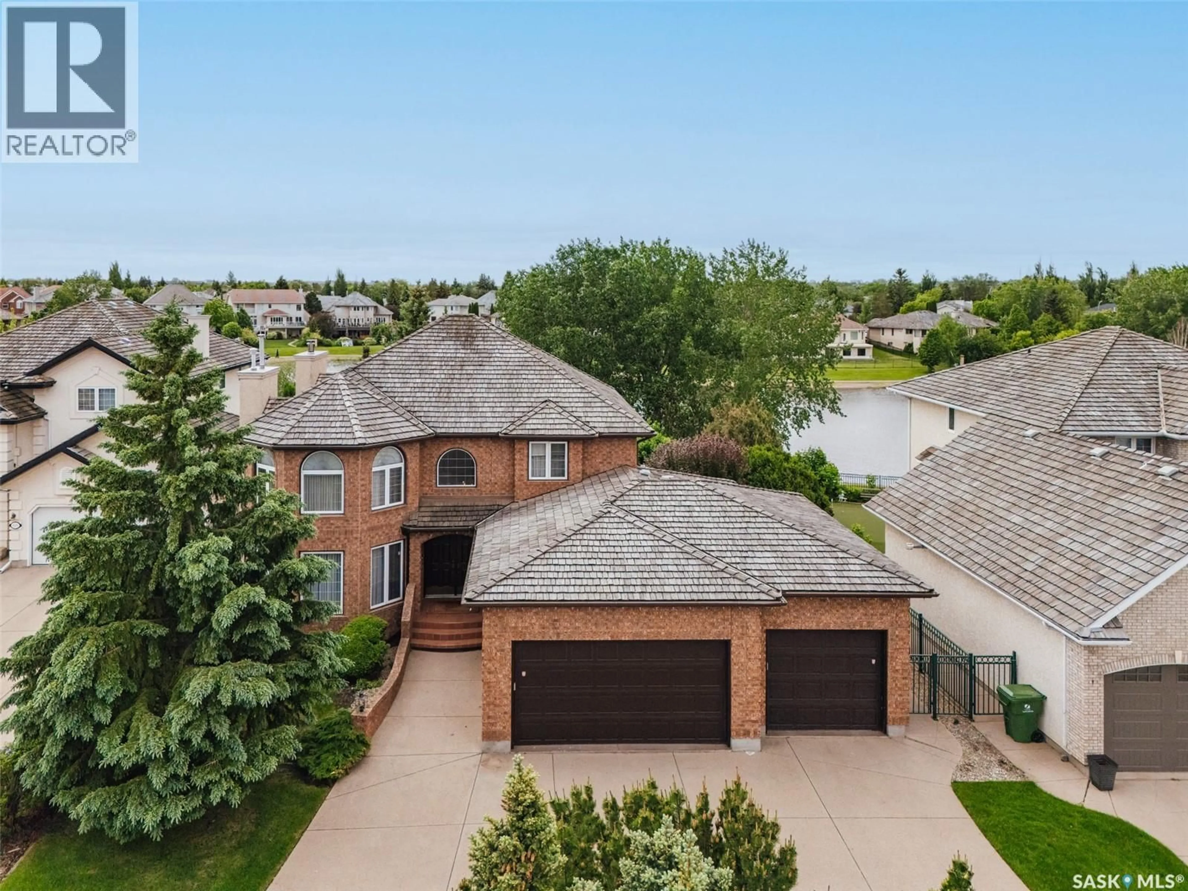 A pic from outside/outdoor area/front of a property/back of a property/a pic from drone, street for 811 BRAESIDE VIEW, Saskatoon Saskatchewan S7V1A7
