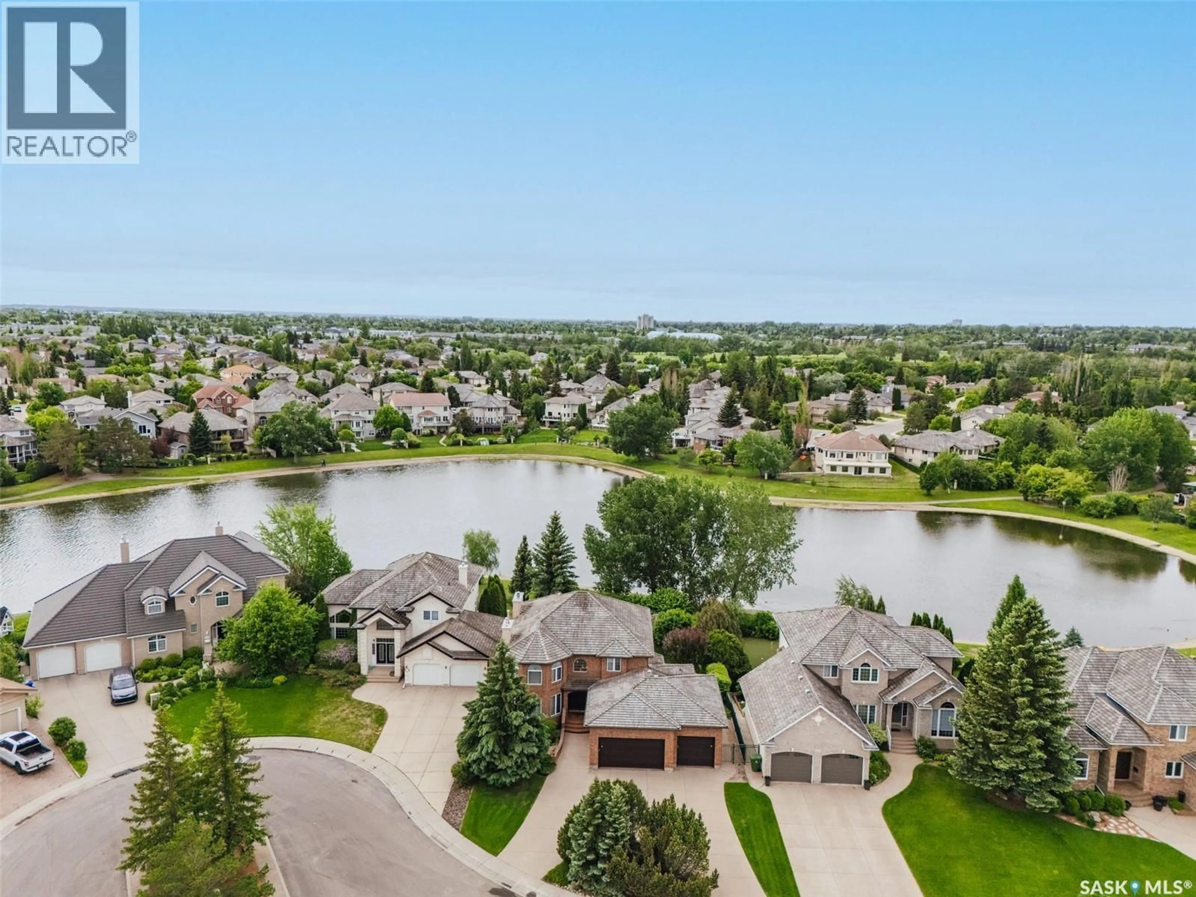 A pic from outside/outdoor area/front of a property/back of a property/a pic from drone, water/lake/river/ocean view for 811 BRAESIDE VIEW, Saskatoon Saskatchewan S7V1A7