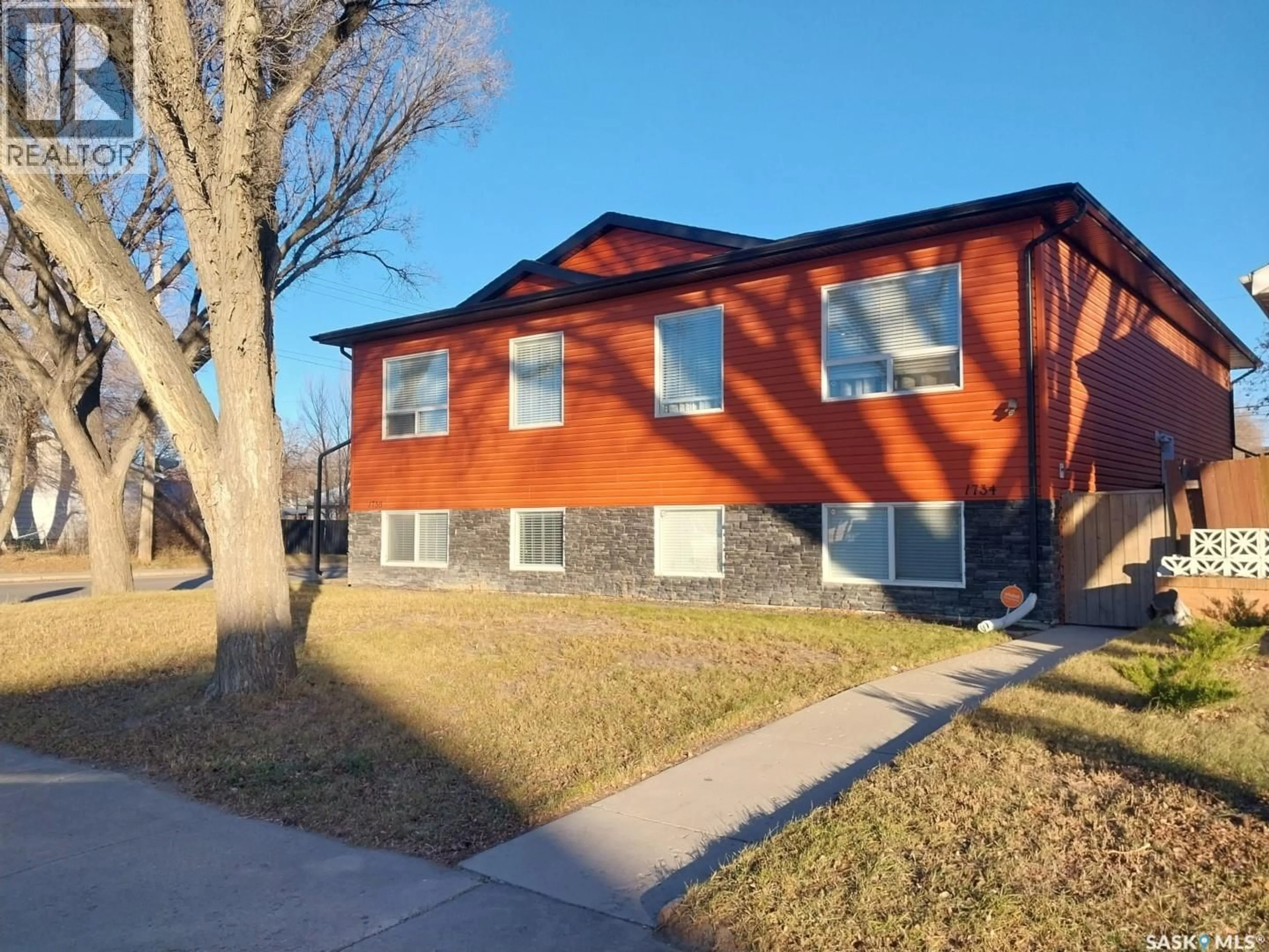 Home with brick exterior material, street for 1736 C AVENUE, Saskatoon Saskatchewan S7L1L7
