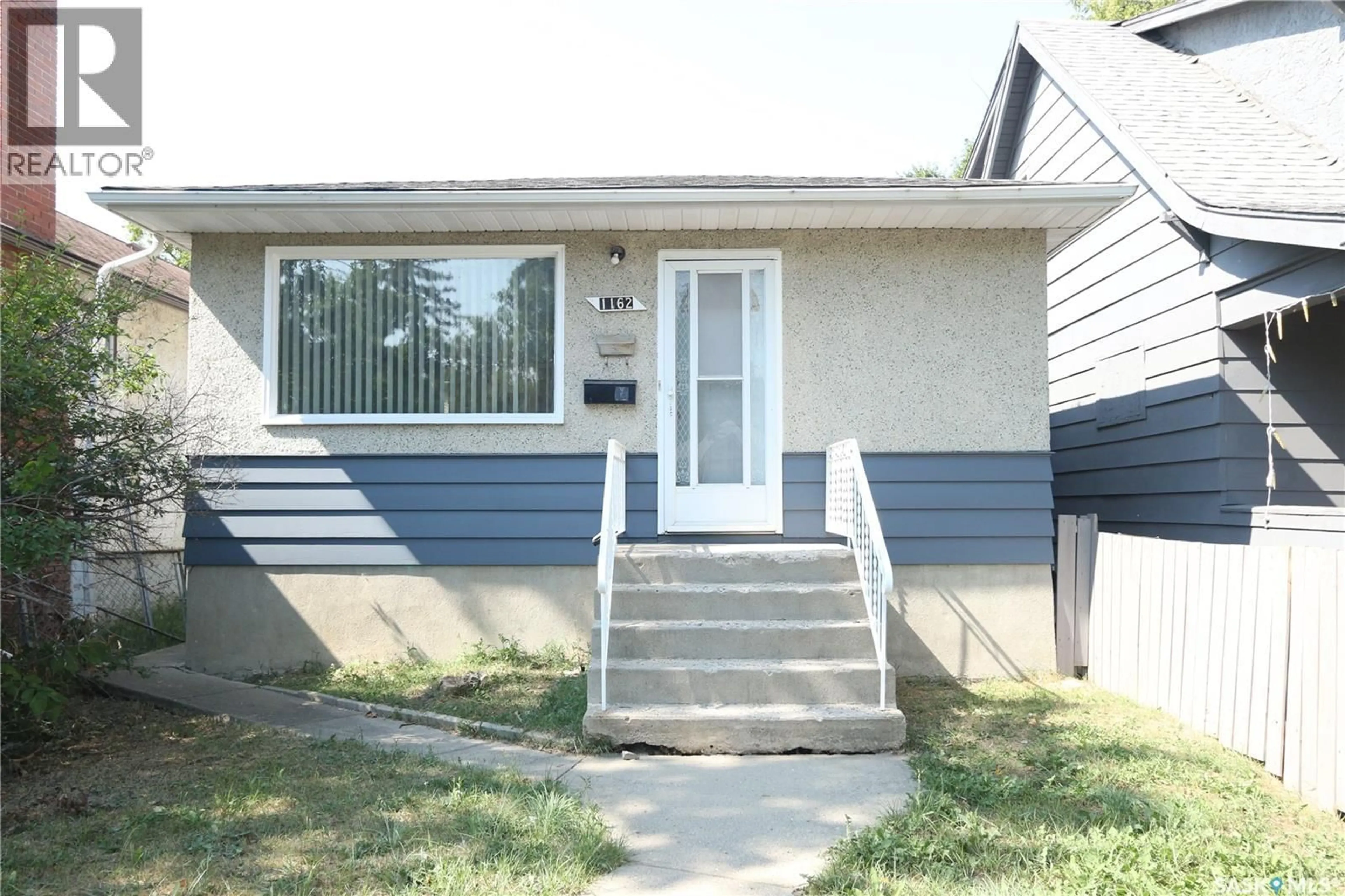 Home with vinyl exterior material, street for 1162 ATHOL STREET, Regina Saskatchewan S4T3C2