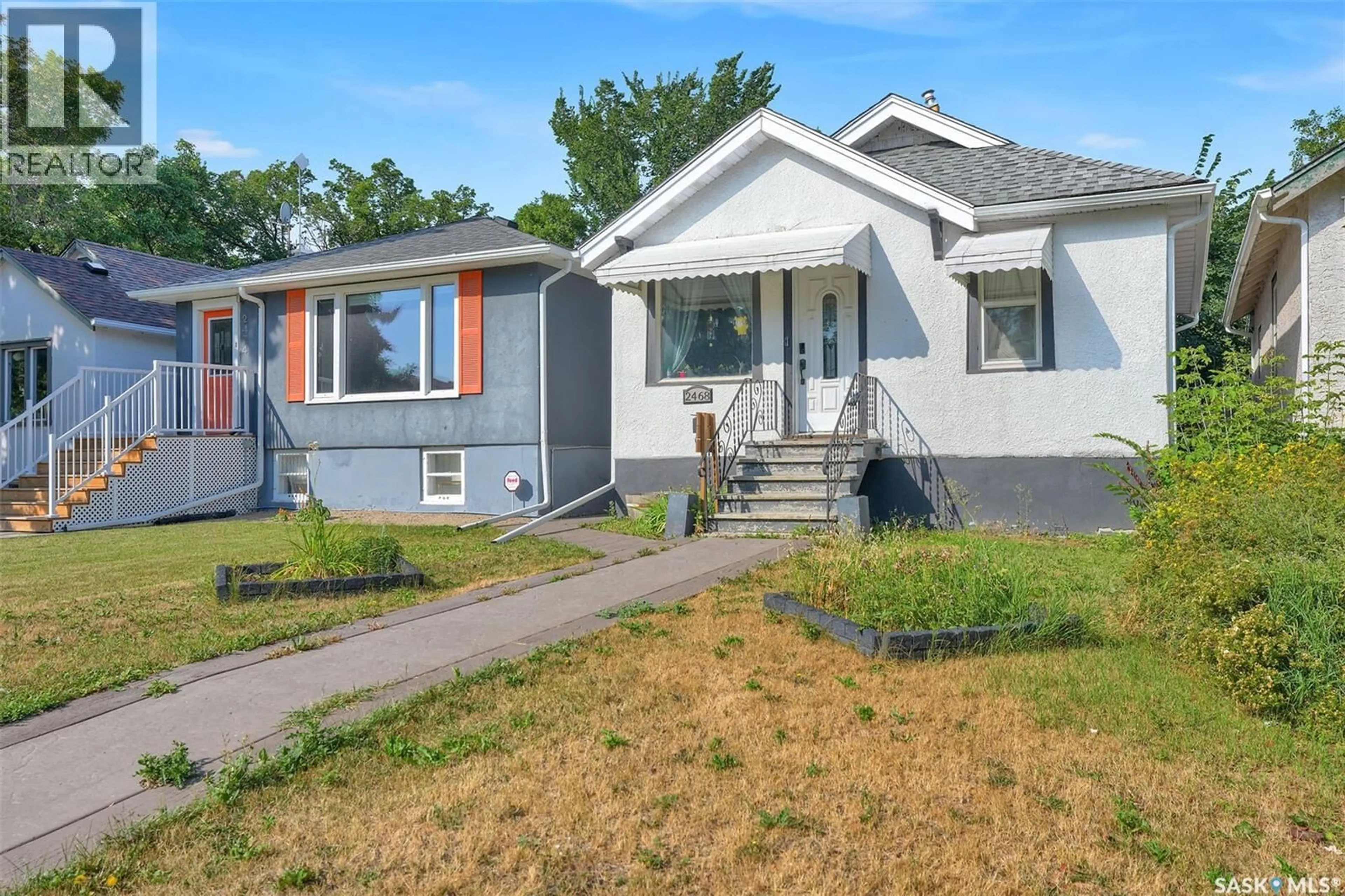 Home with vinyl exterior material, street for 2468 ELLIOTT STREET, Regina Saskatchewan S4N3H3