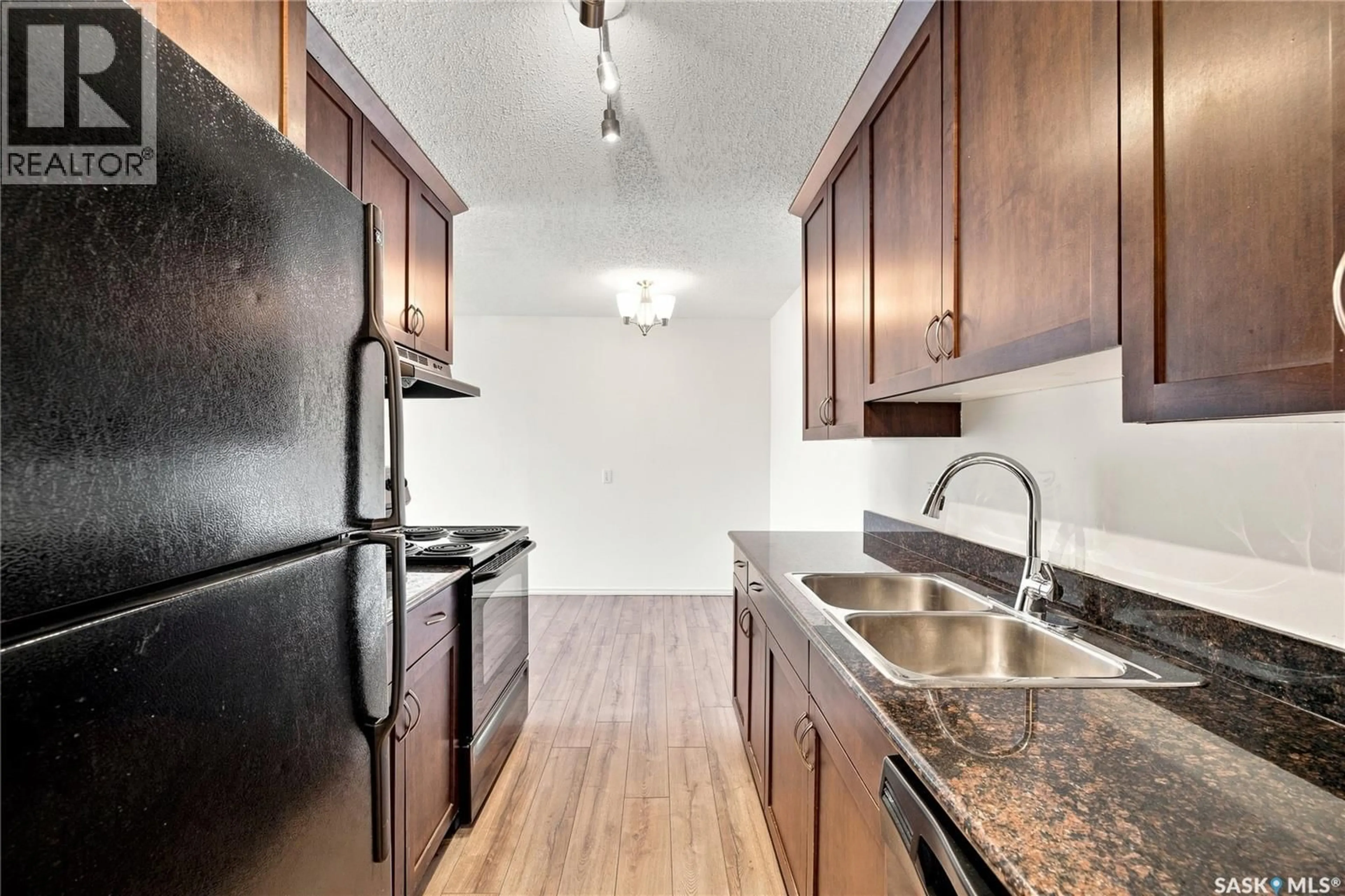 Standard kitchen, unknown for 410 2233 ST HENRY AVENUE, Saskatoon Saskatchewan S7M5K9