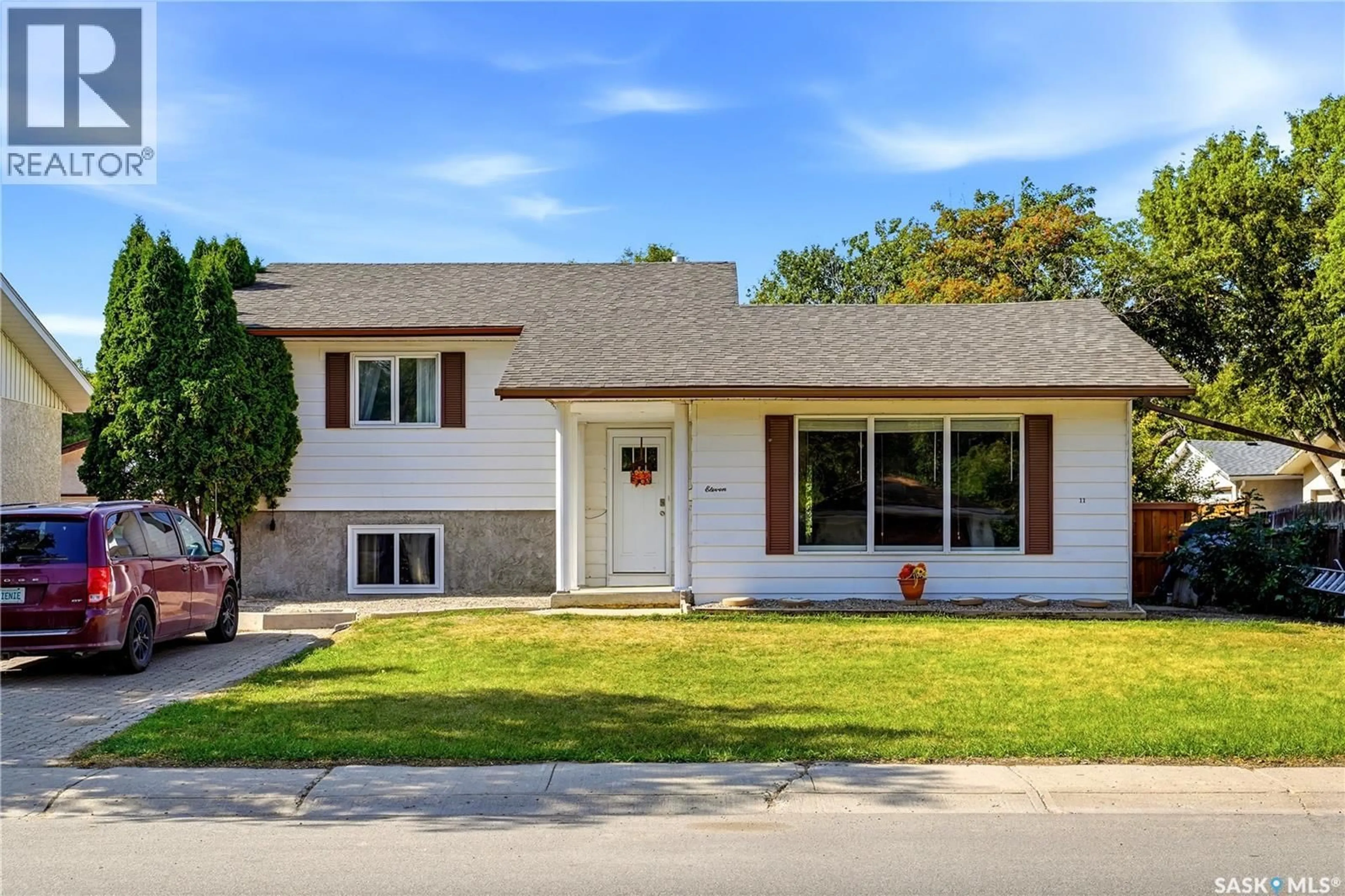 Home with vinyl exterior material, street for 11 MCSHERRY CRESCENT, Regina Saskatchewan S4T7B4