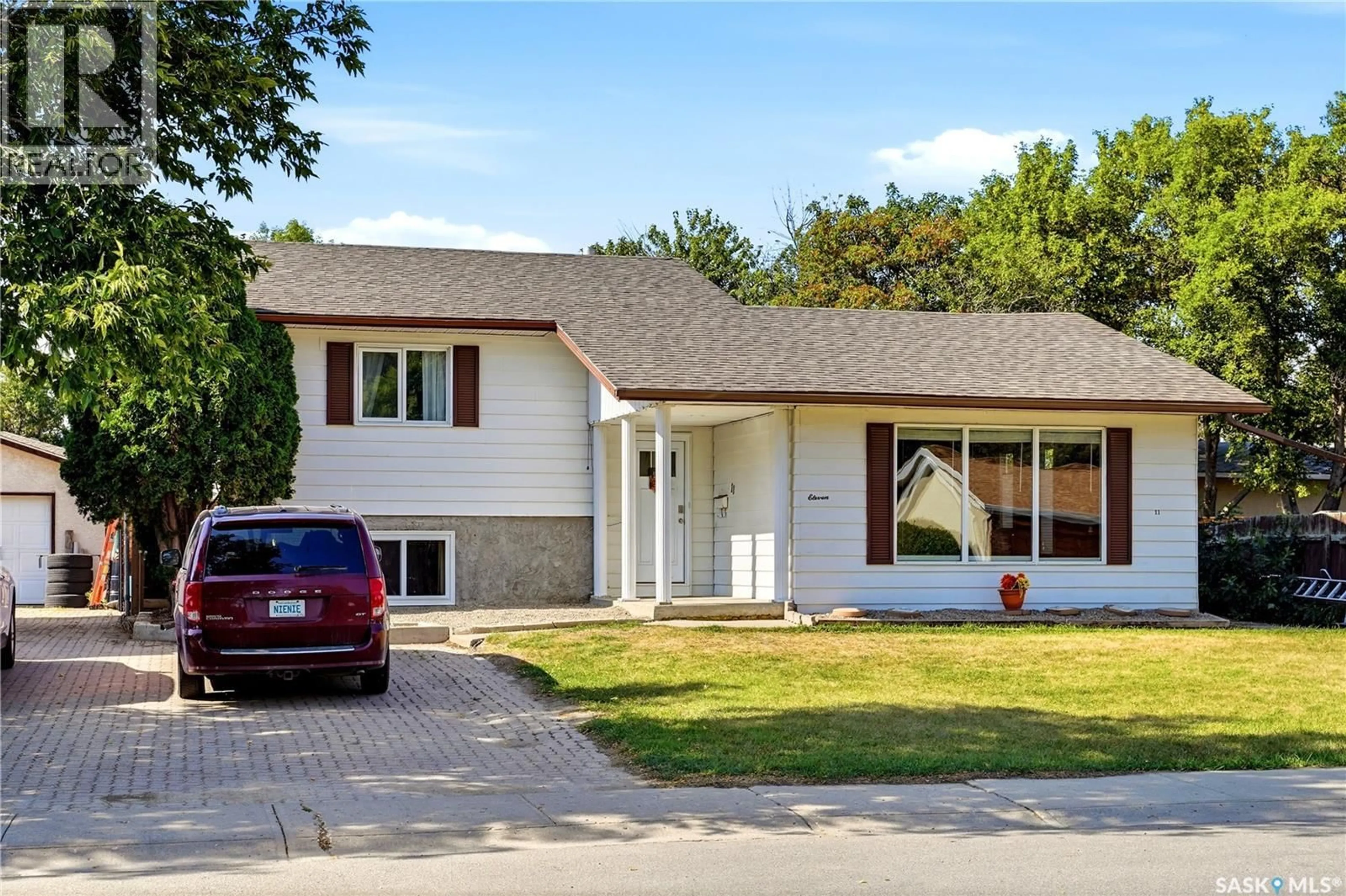 Home with vinyl exterior material, street for 11 MCSHERRY CRESCENT, Regina Saskatchewan S4T7B4