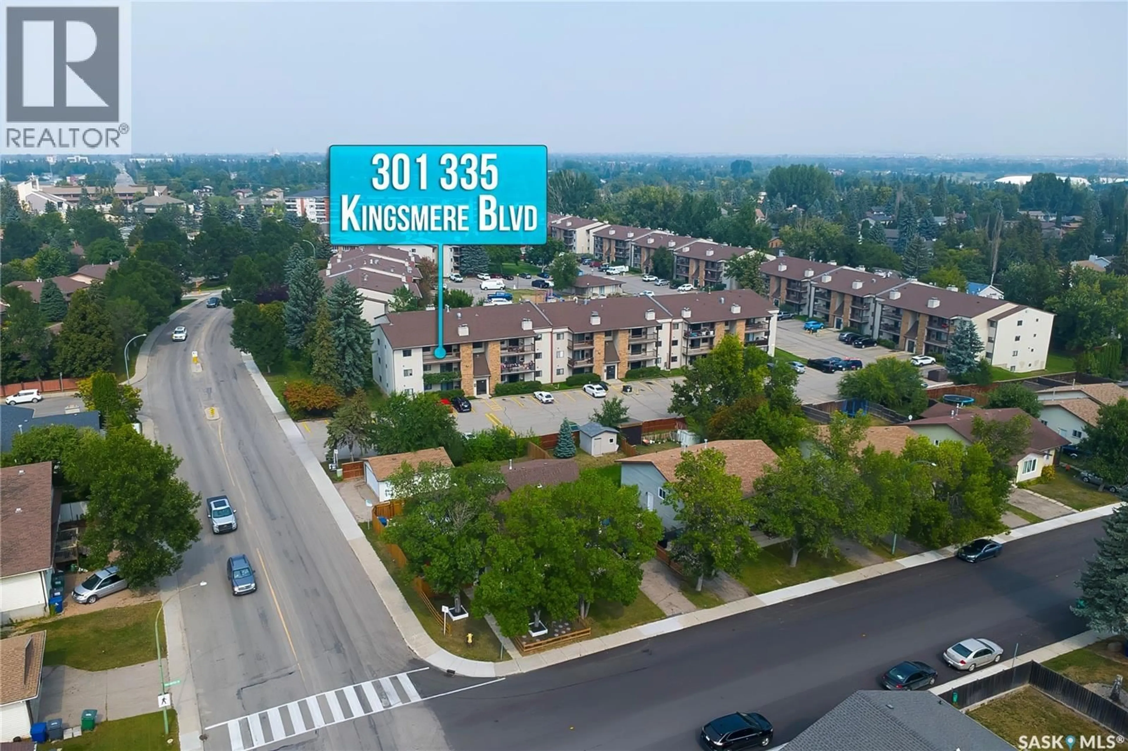 A pic from outside/outdoor area/front of a property/back of a property/a pic from drone, unknown for 335 - 301 KINGSMERE BOULEVARD, Saskatoon Saskatchewan S7J4J6