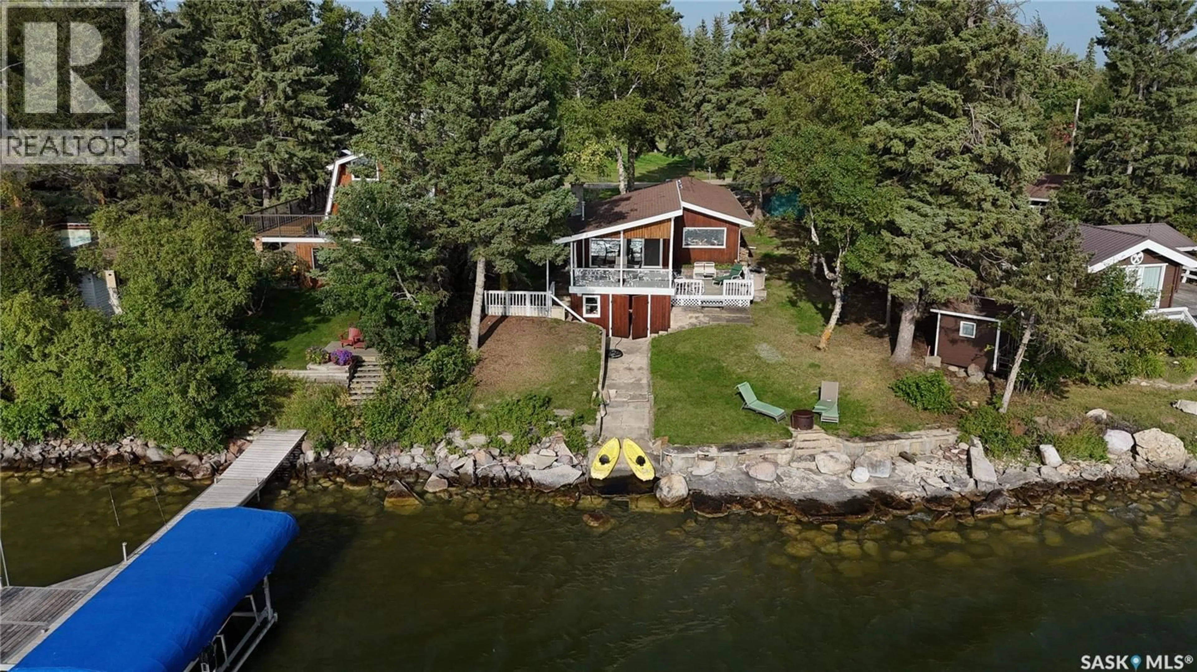 A pic from outside/outdoor area/front of a property/back of a property/a pic from drone, water/lake/river/ocean view for 2220 SPRUCE CRESCENT, Turtle View Saskatchewan S0M0Y0