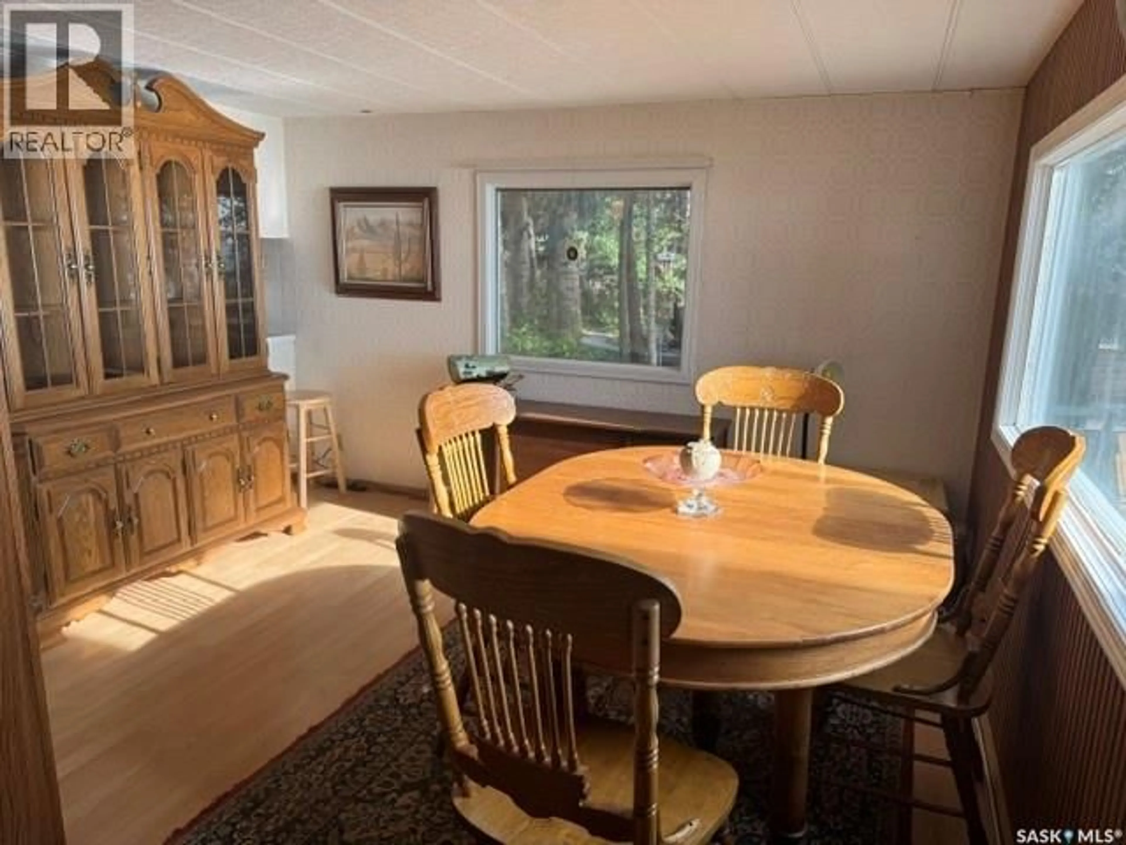 Dining room, wood/laminate floor for 2220 SPRUCE CRESCENT, Turtle View Saskatchewan S0M0Y0