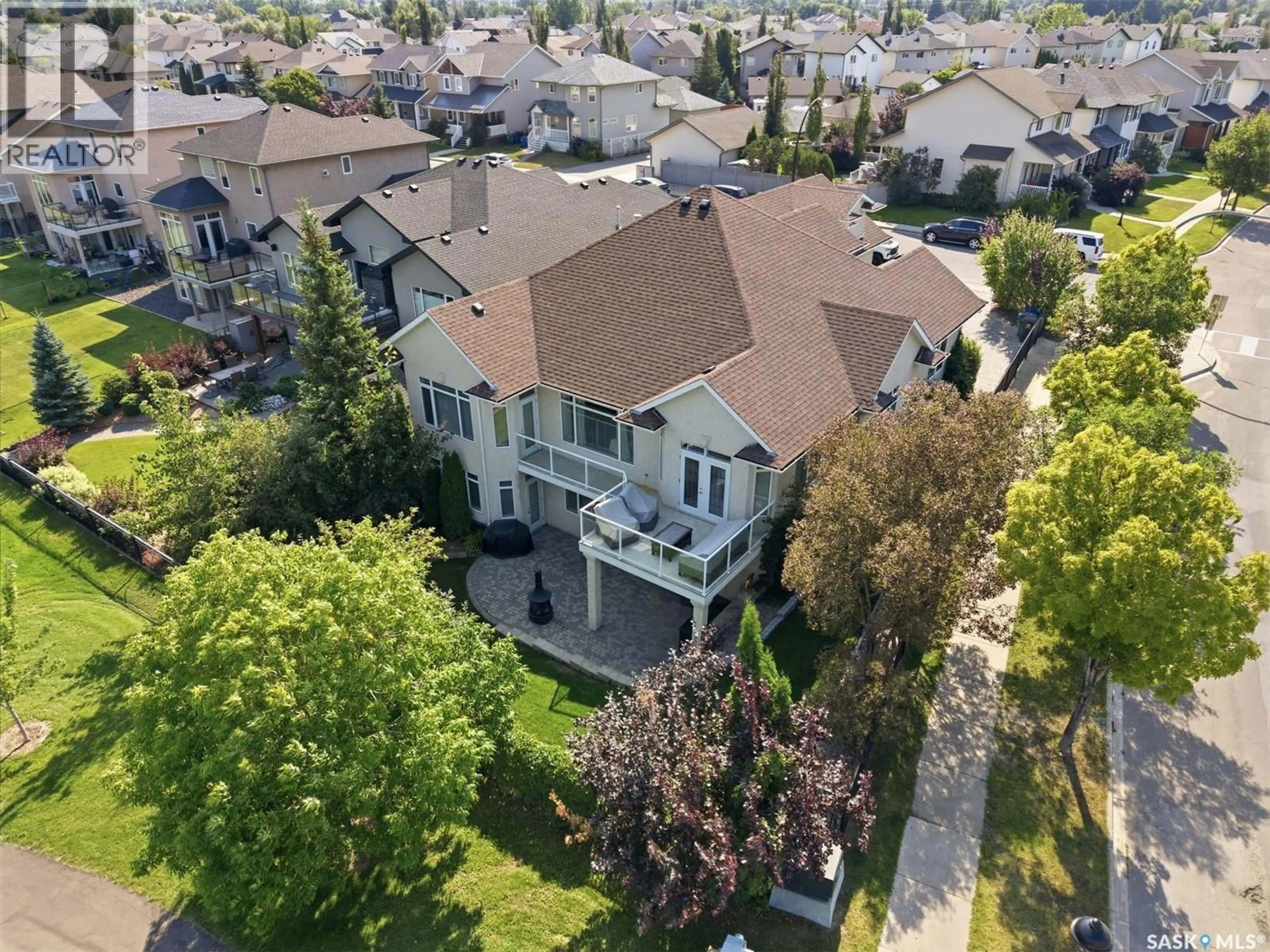 A pic from outside/outdoor area/front of a property/back of a property/a pic from drone, street for 934 MAGUIRE CRESCENT, Saskatoon Saskatchewan S7W1A5