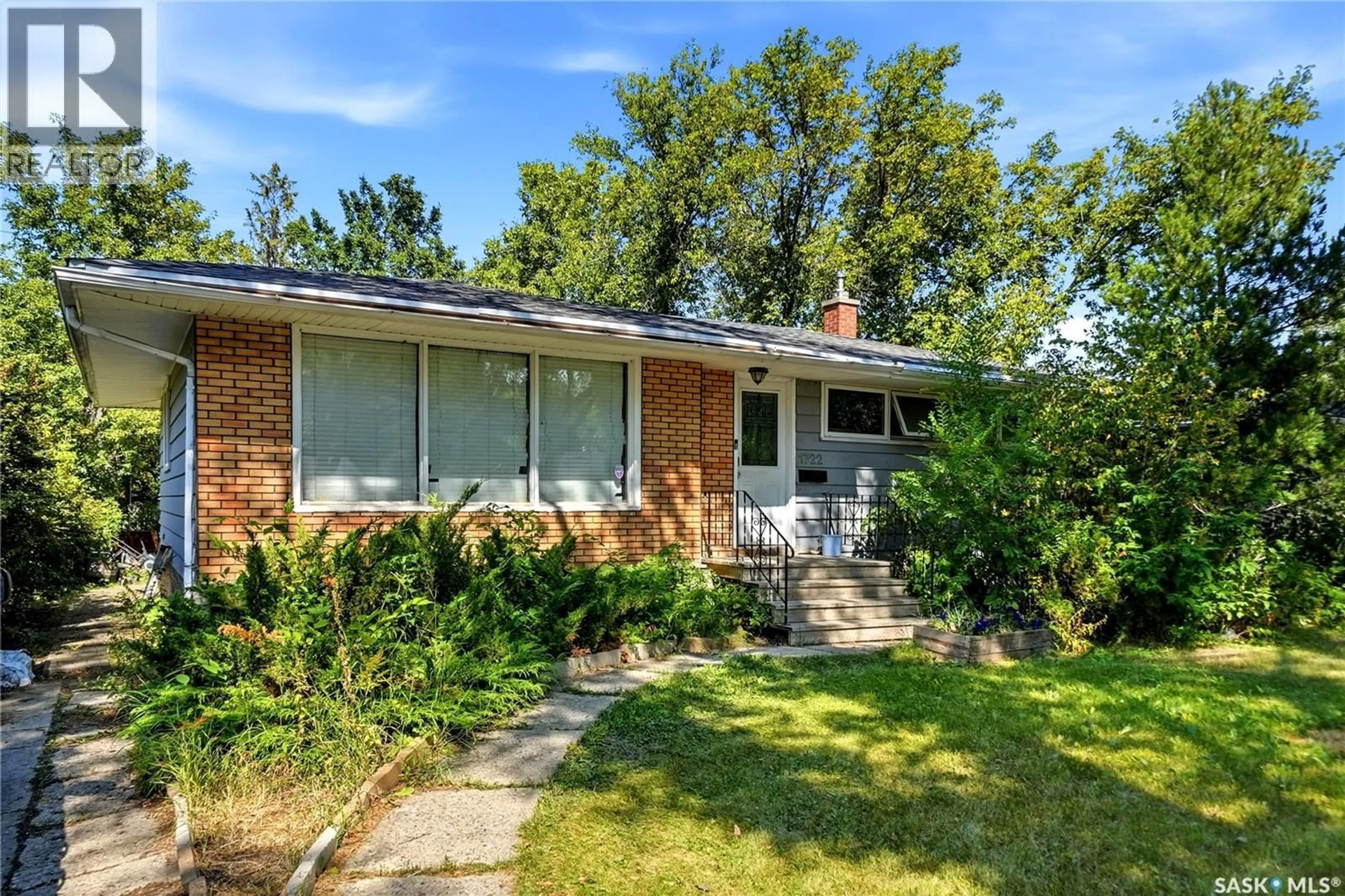 Home with brick exterior material, street for 1722 MACPHERSON AVENUE, Regina Saskatchewan S4S4C9