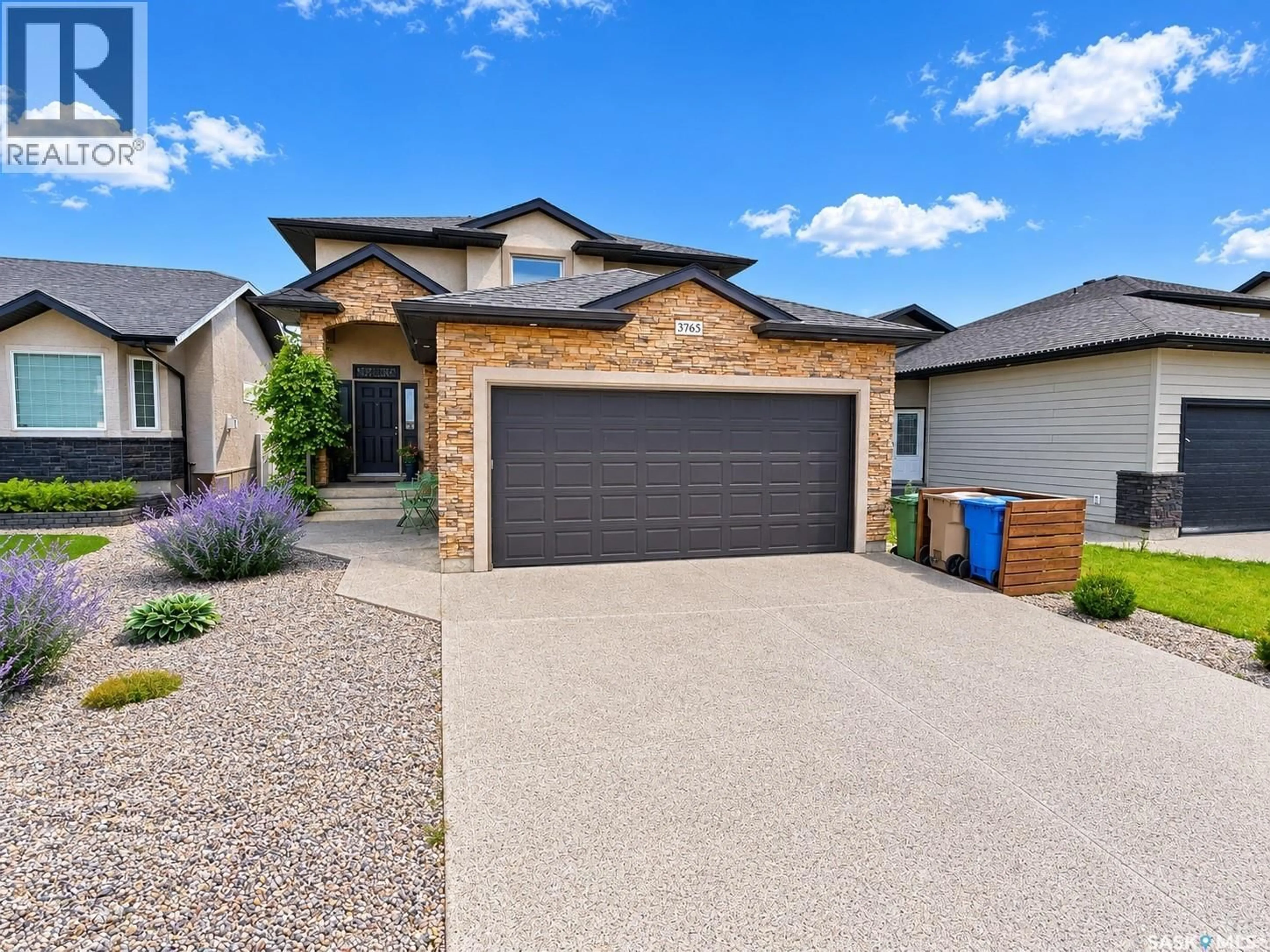 Home with brick exterior material, street for 3765 GREEN MOSS LANE, Regina Saskatchewan S4V1P7