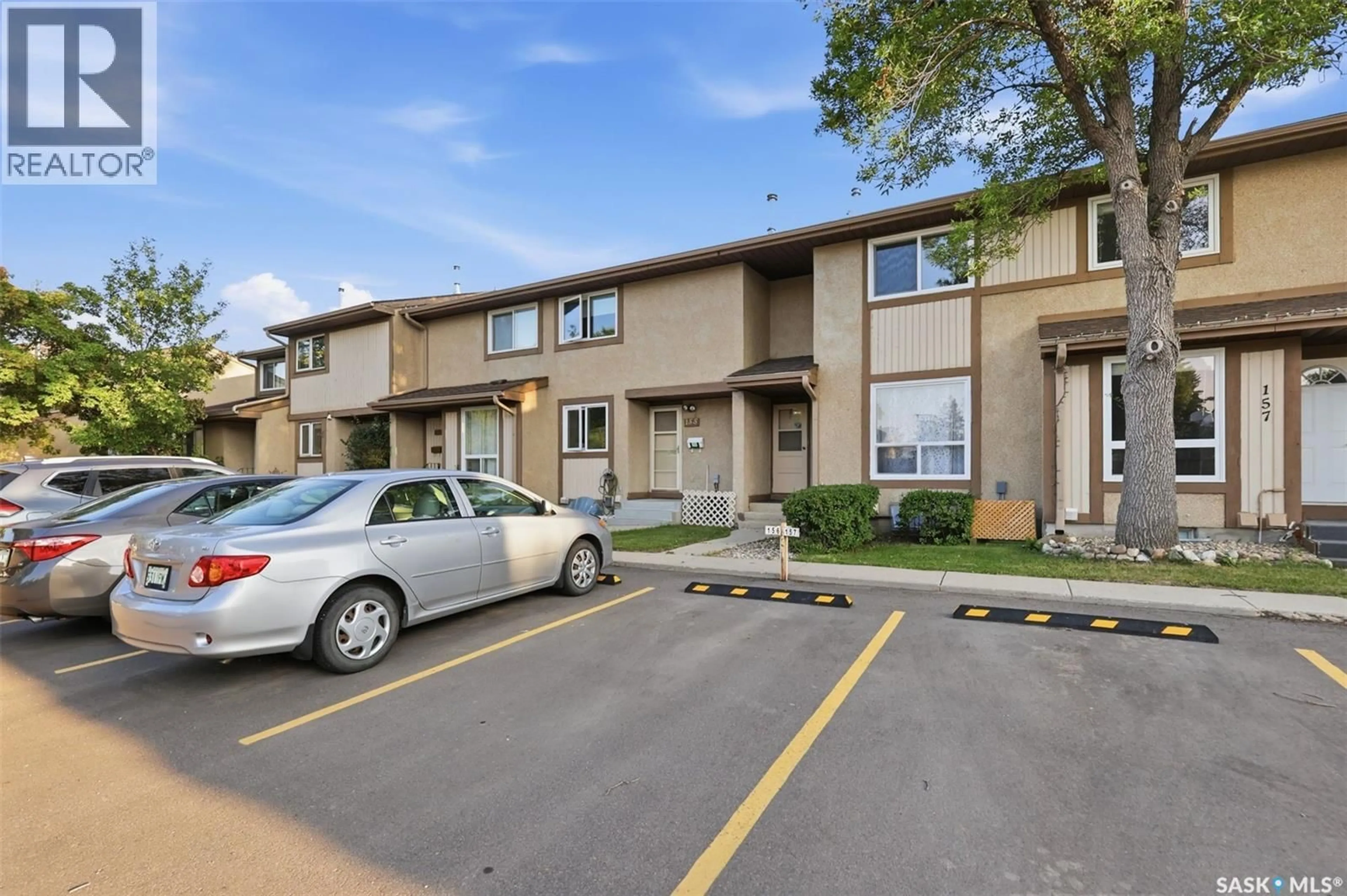 A pic from outside/outdoor area/front of a property/back of a property/a pic from drone, street for 156 1128 MCKERCHER DRIVE, Saskatoon Saskatchewan S7H4Y7