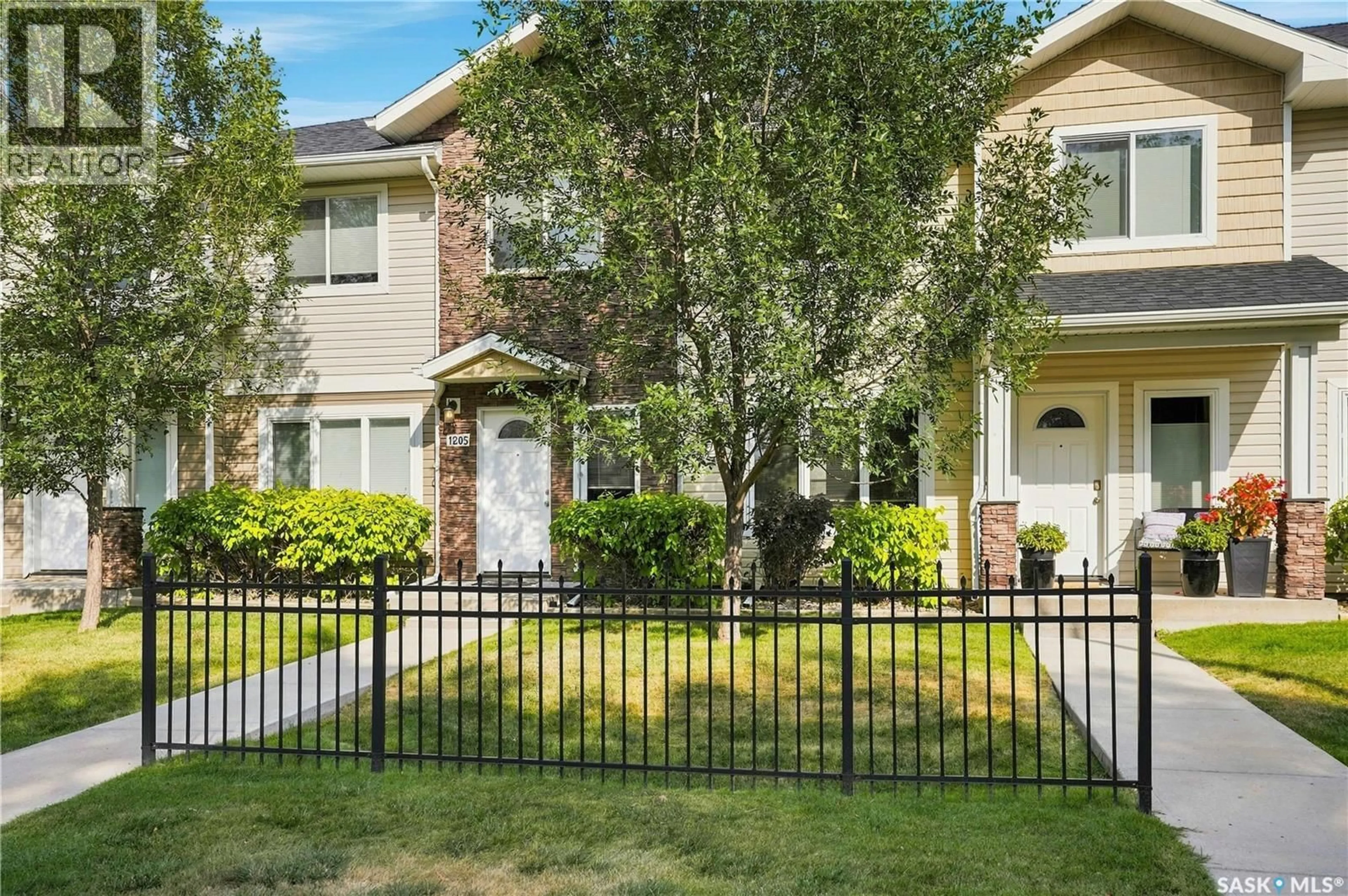 Home with vinyl exterior material, street for 1205 GREY STREET, Regina Saskatchewan S4T1G7