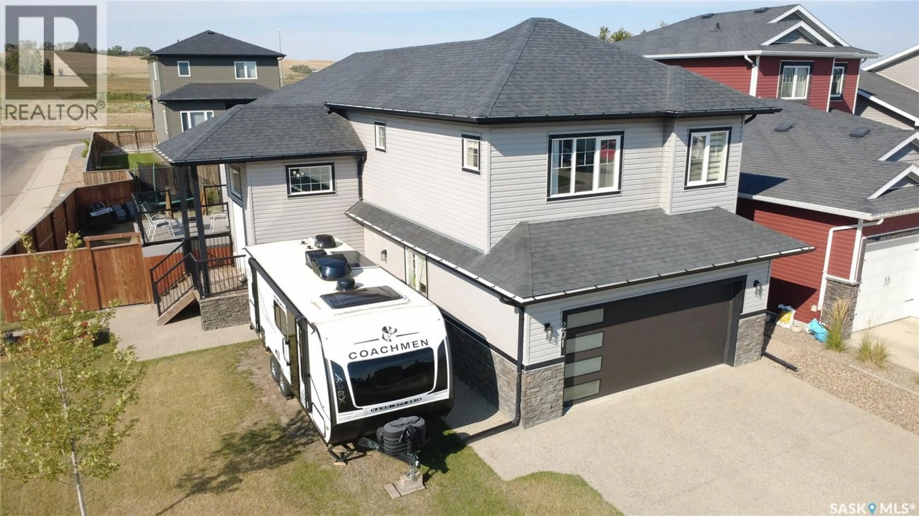 A pic from outside/outdoor area/front of a property/back of a property/a pic from drone, street for 201 VALLEY MEADOW COURT, Swift Current Saskatchewan S9H5N2