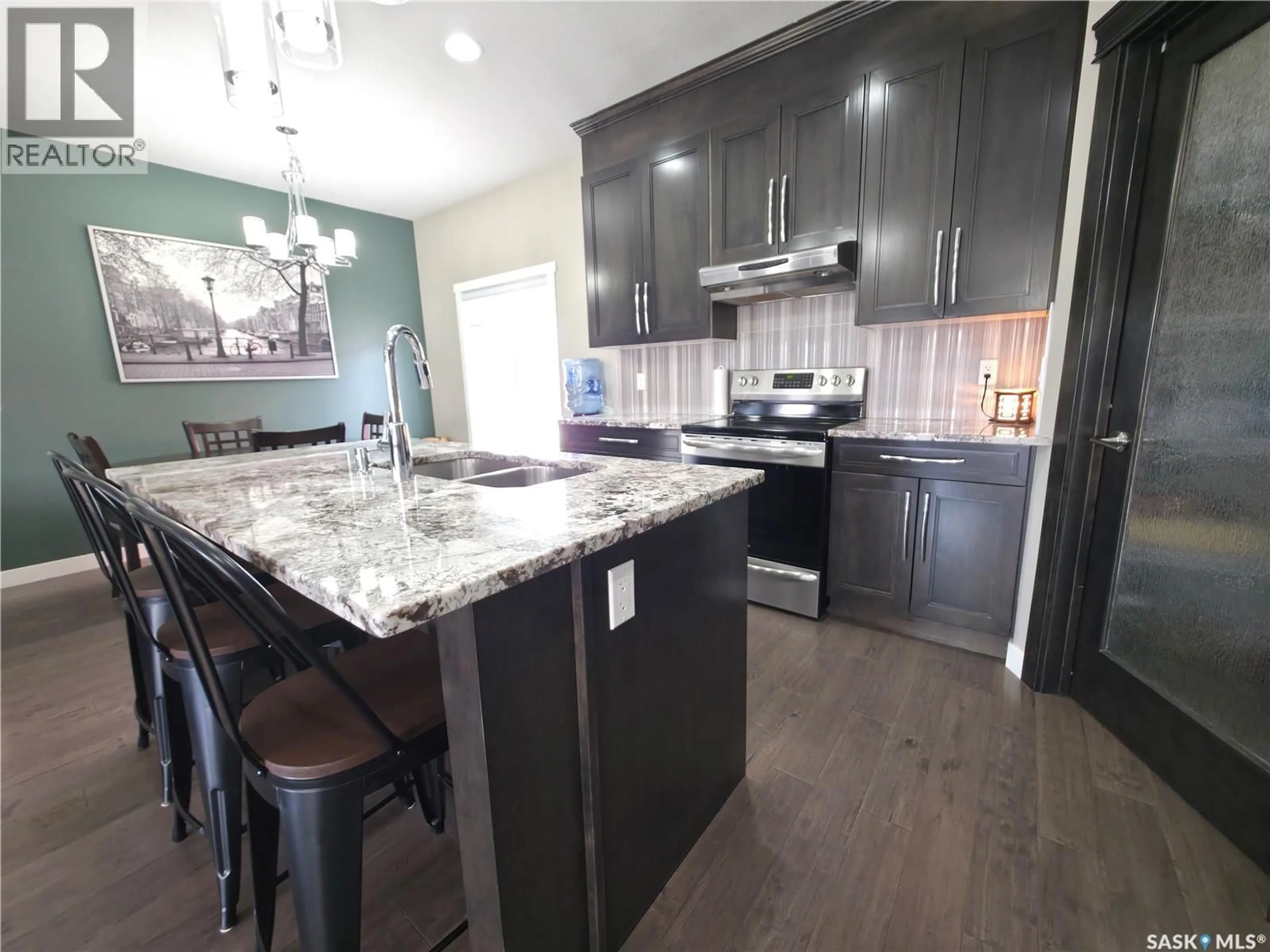 Open concept kitchen, unknown for 201 VALLEY MEADOW COURT, Swift Current Saskatchewan S9H5N2