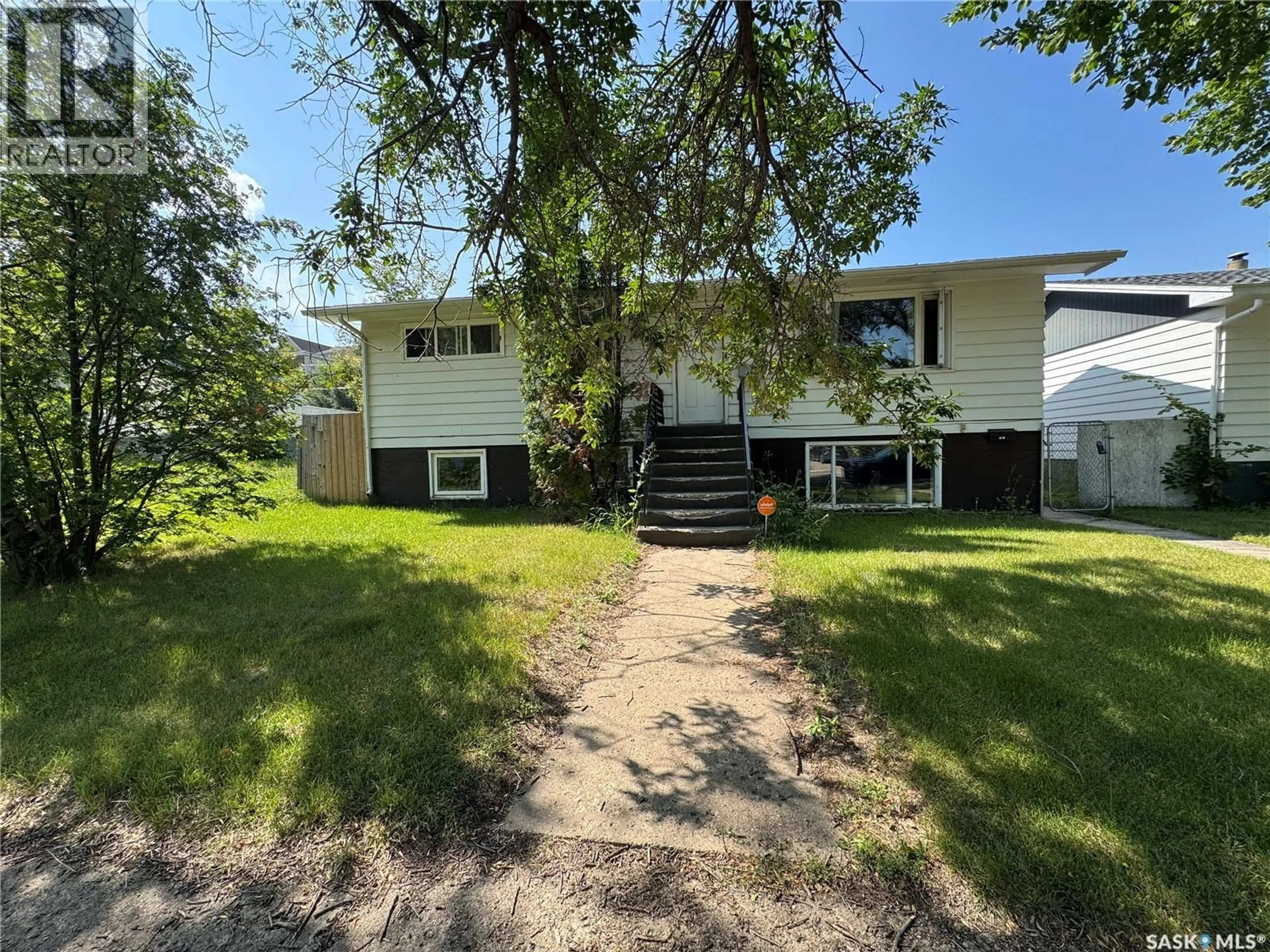 A pic from outside/outdoor area/front of a property/back of a property/a pic from drone, street for 1051 109TH STREET, North Battleford Saskatchewan S9A2E3