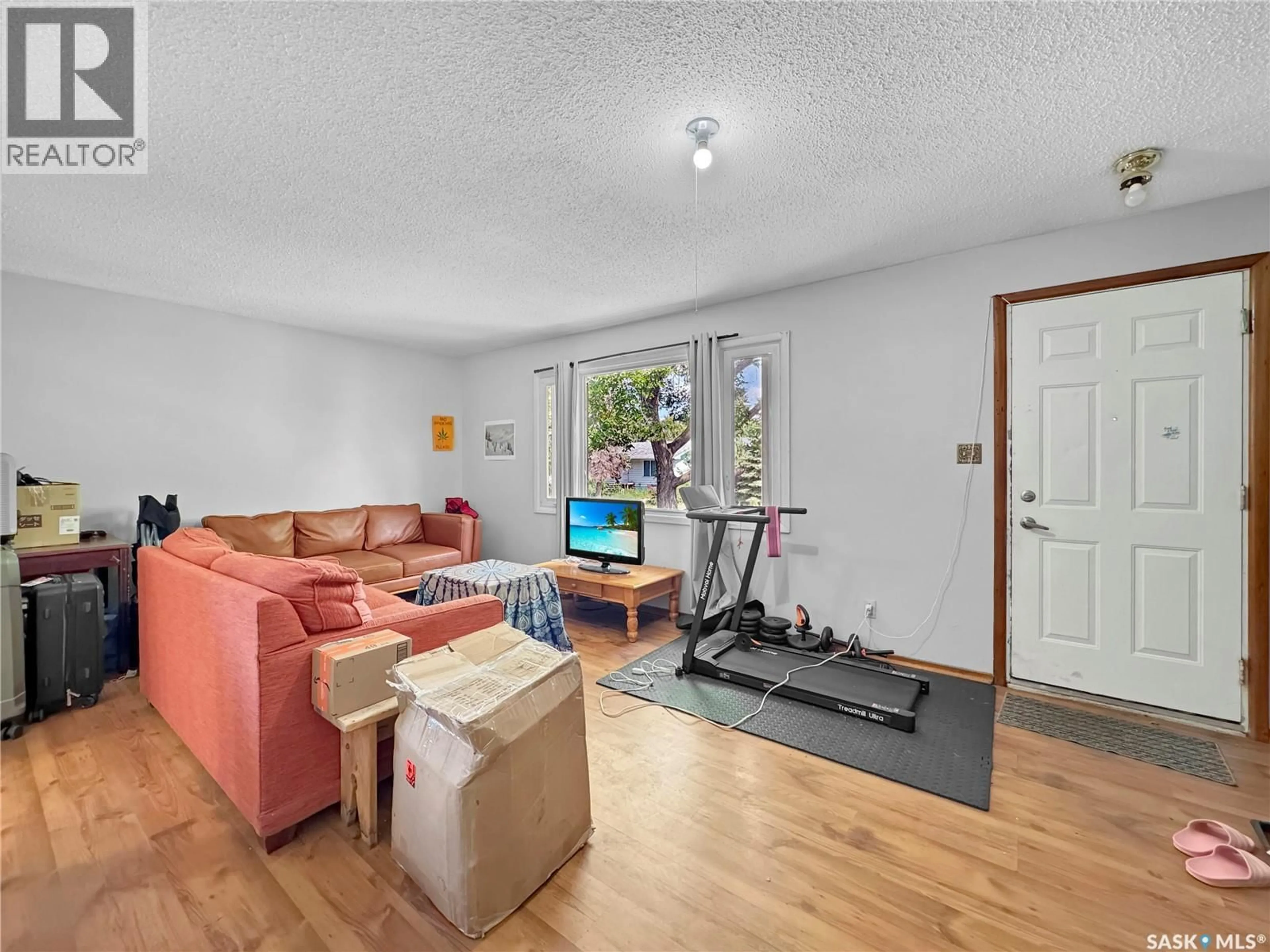 Living room with furniture, unknown for 1051 109TH STREET, North Battleford Saskatchewan S9A2E3