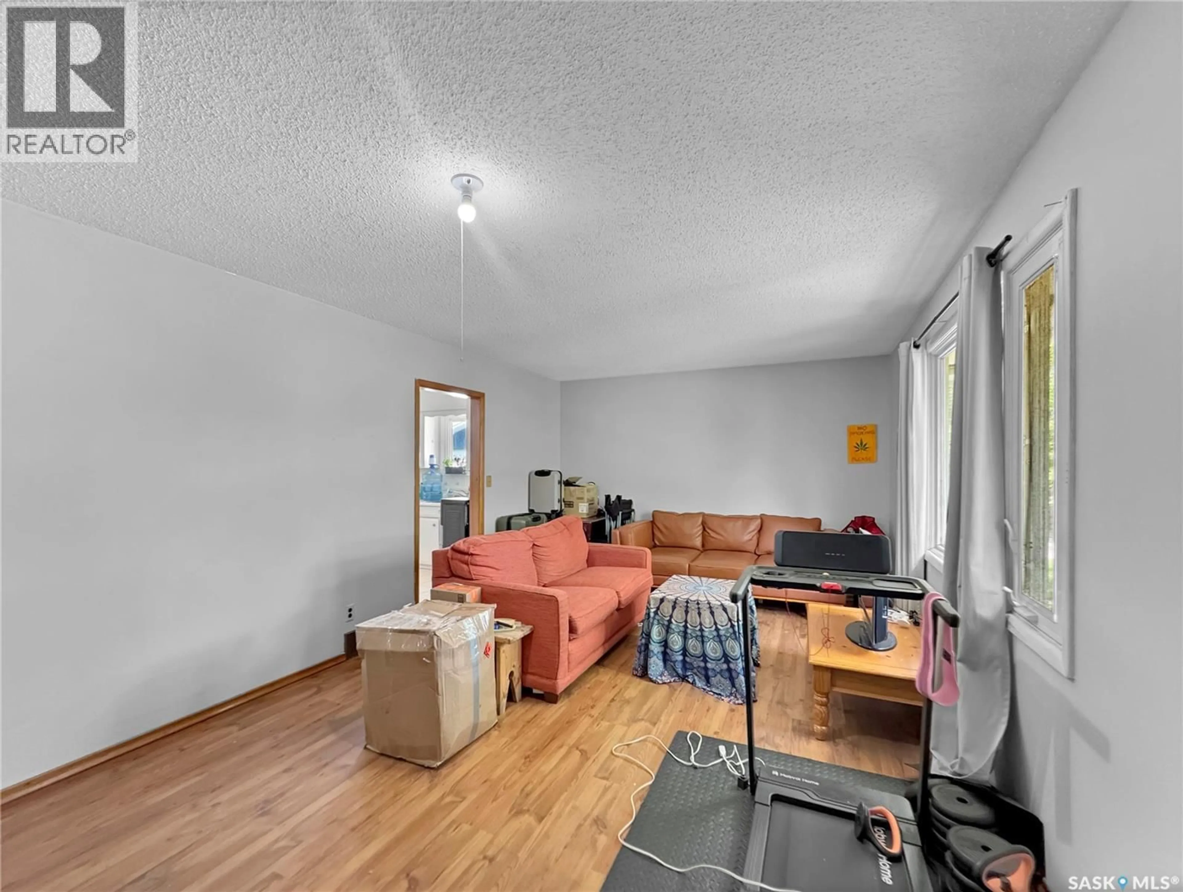 Living room with furniture, unknown for 1051 109TH STREET, North Battleford Saskatchewan S9A2E3