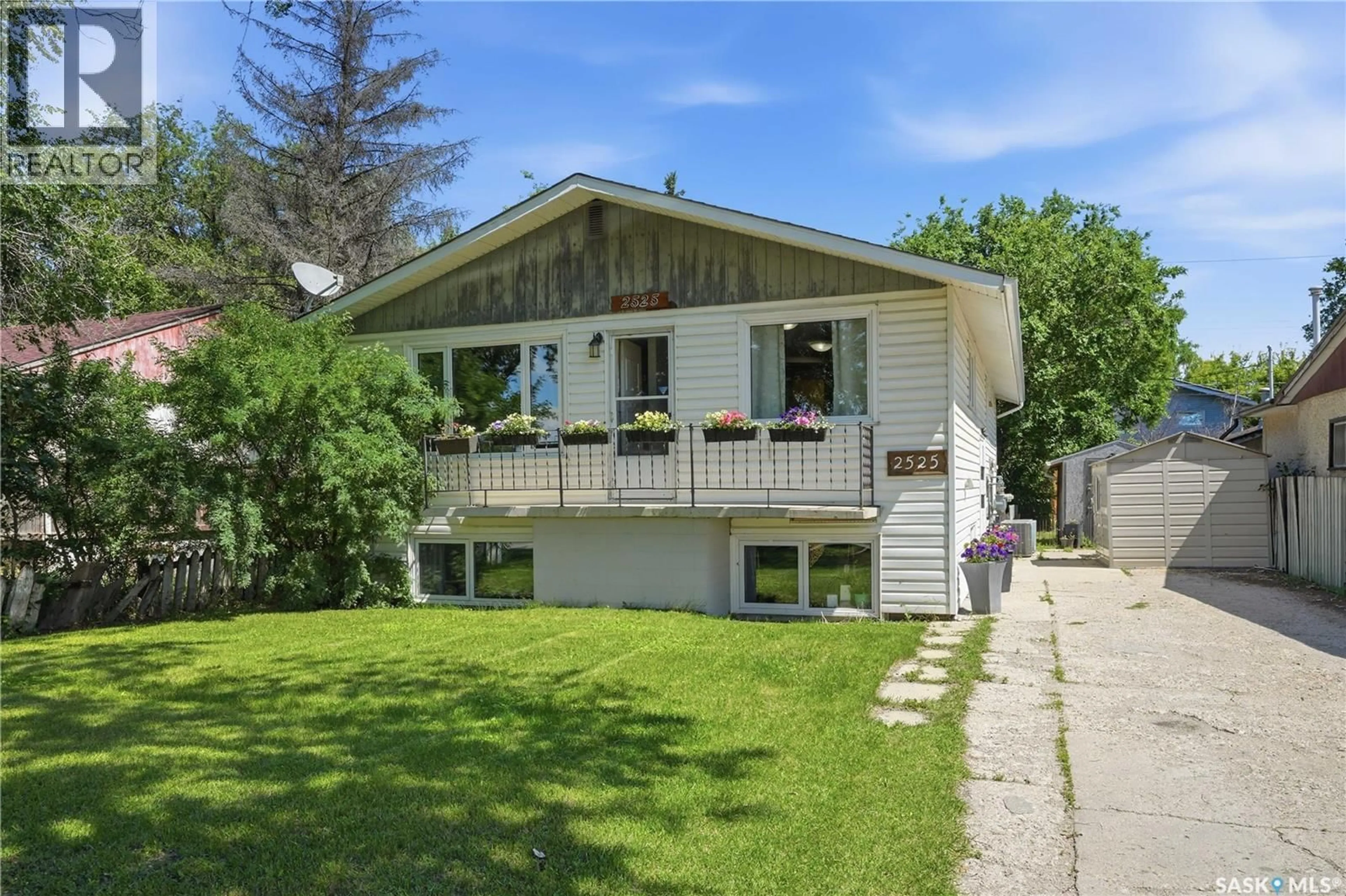 Home with vinyl exterior material, street for 2525 MCPHERSON AVENUE, Saskatoon Saskatchewan S7J0T2