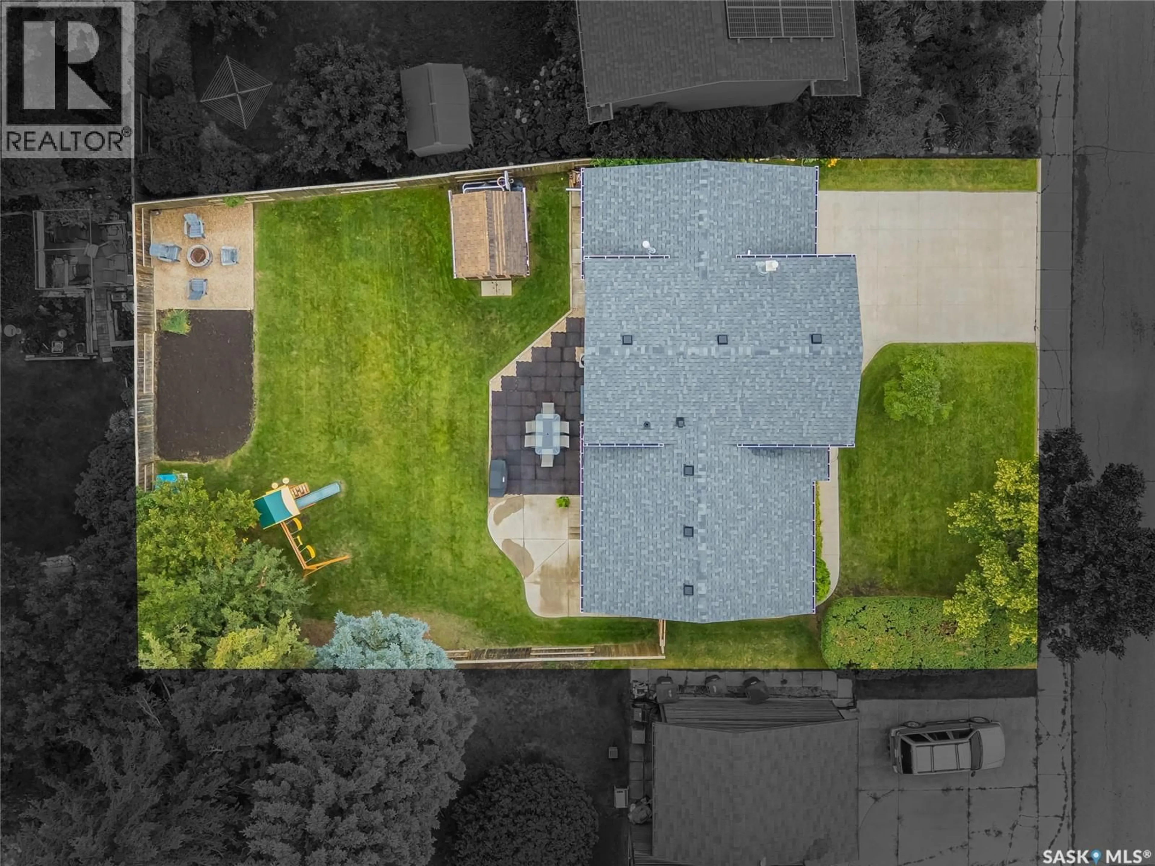 A pic from outside/outdoor area/front of a property/back of a property/a pic from drone, street for 15 DRAGAN CRESCENT, Saskatoon Saskatchewan S7H5C8