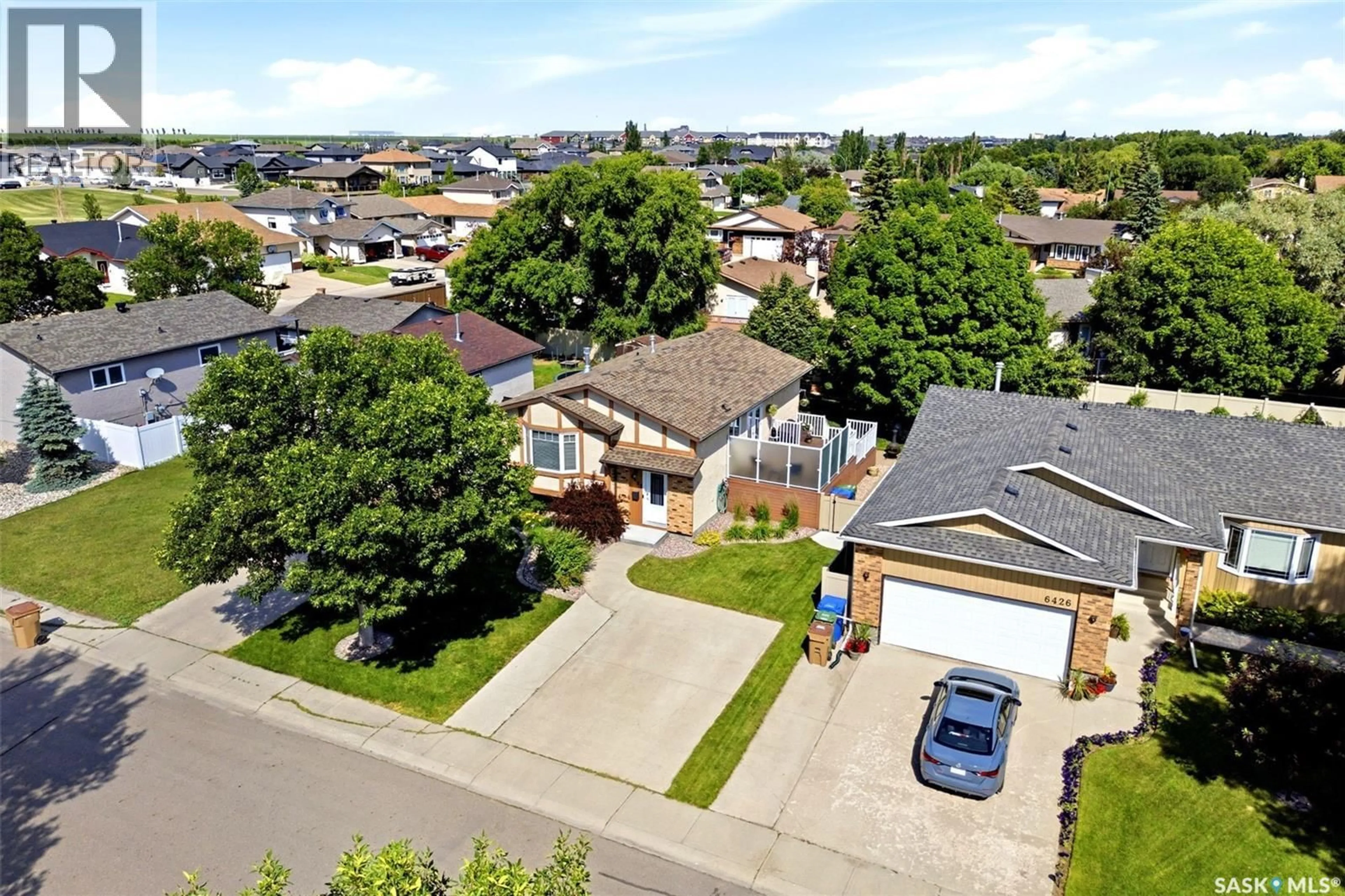 A pic from outside/outdoor area/front of a property/back of a property/a pic from drone, street for 6422 HIRD CRESCENT, Regina Saskatchewan S4X4G8