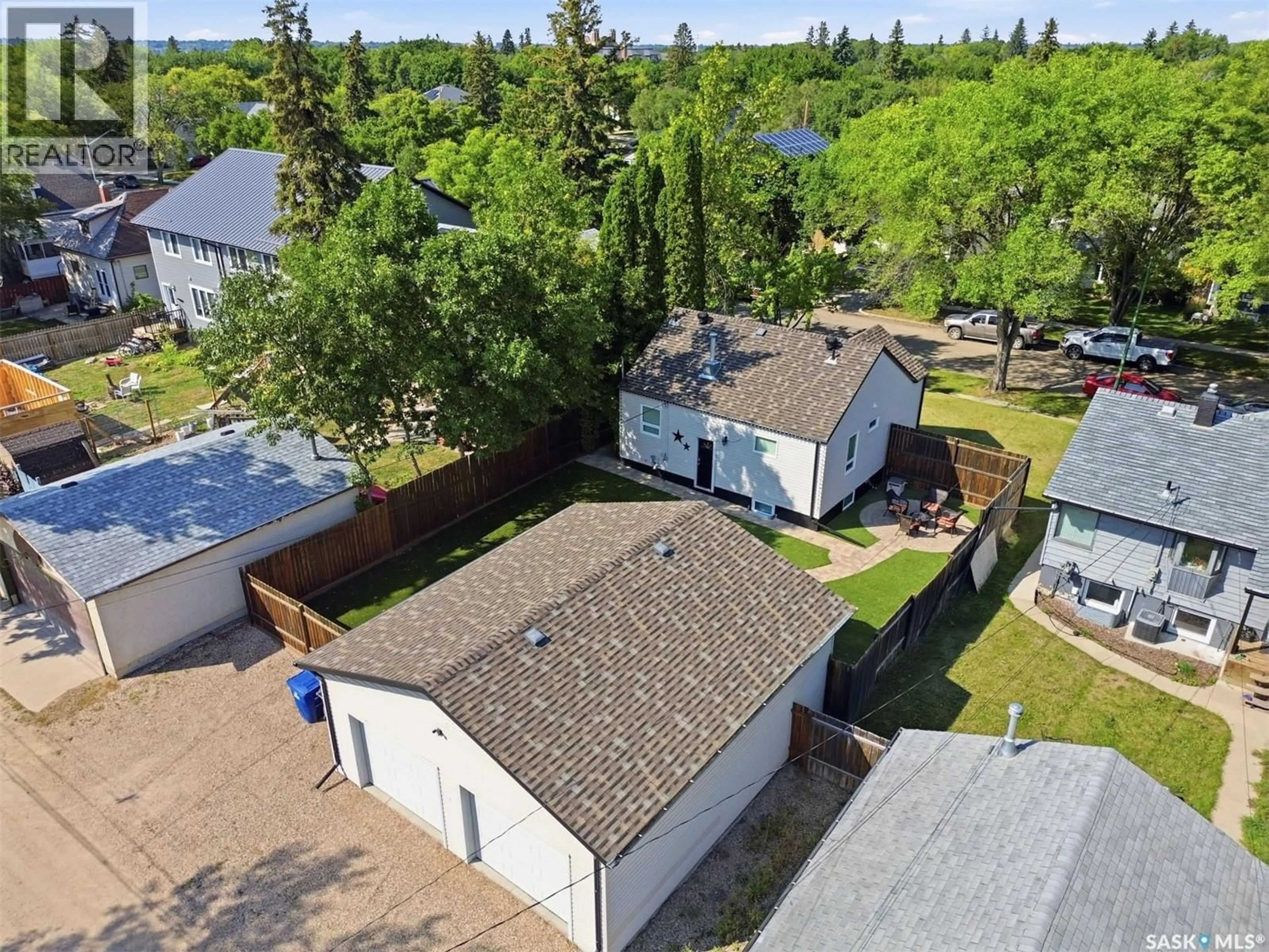 A pic from outside/outdoor area/front of a property/back of a property/a pic from drone, street for 220 3RD STREET, Saskatoon Saskatchewan S7H1L3