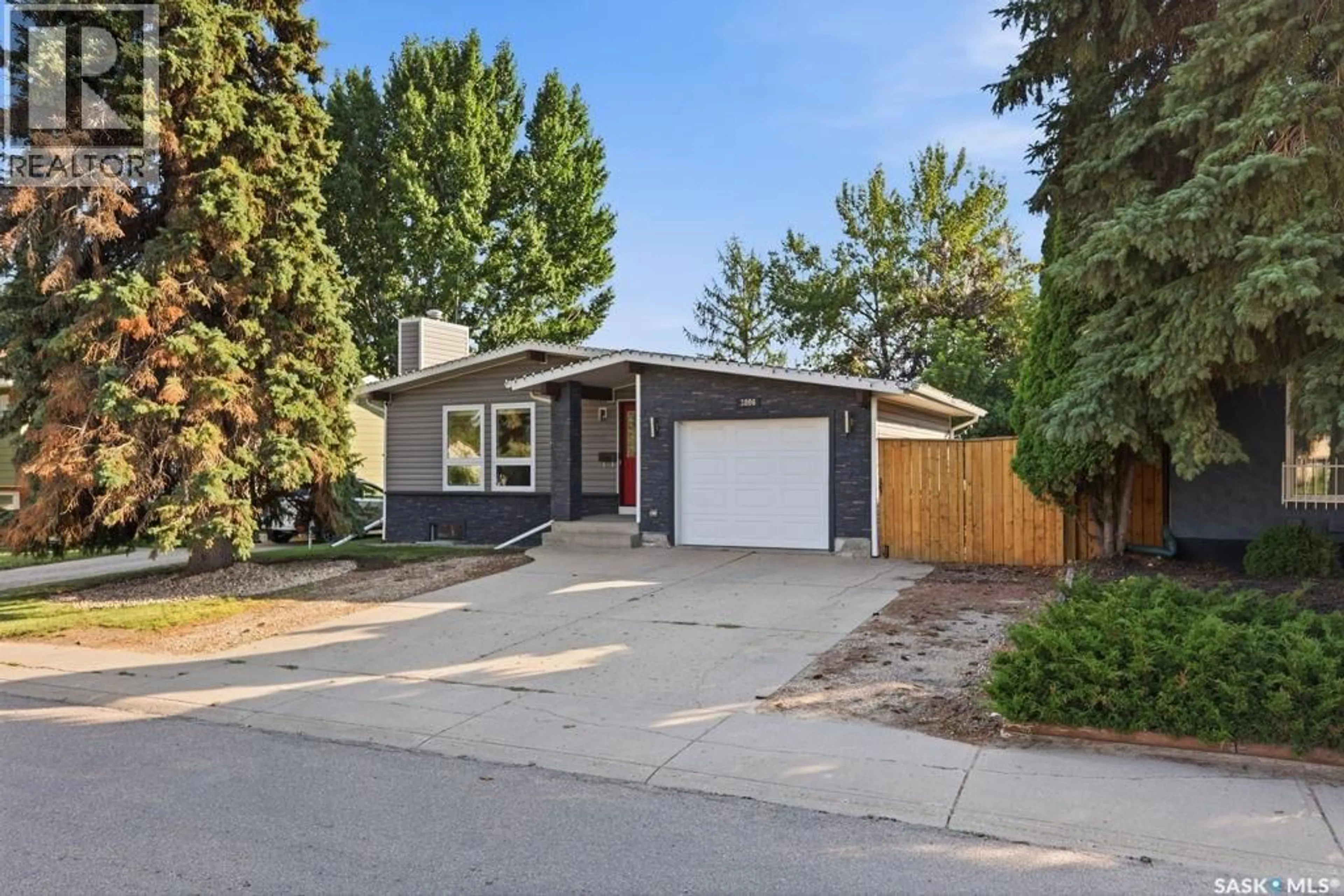 Home with vinyl exterior material, street for 3806 TAYLOR STREET, Saskatoon Saskatchewan S7H5J4