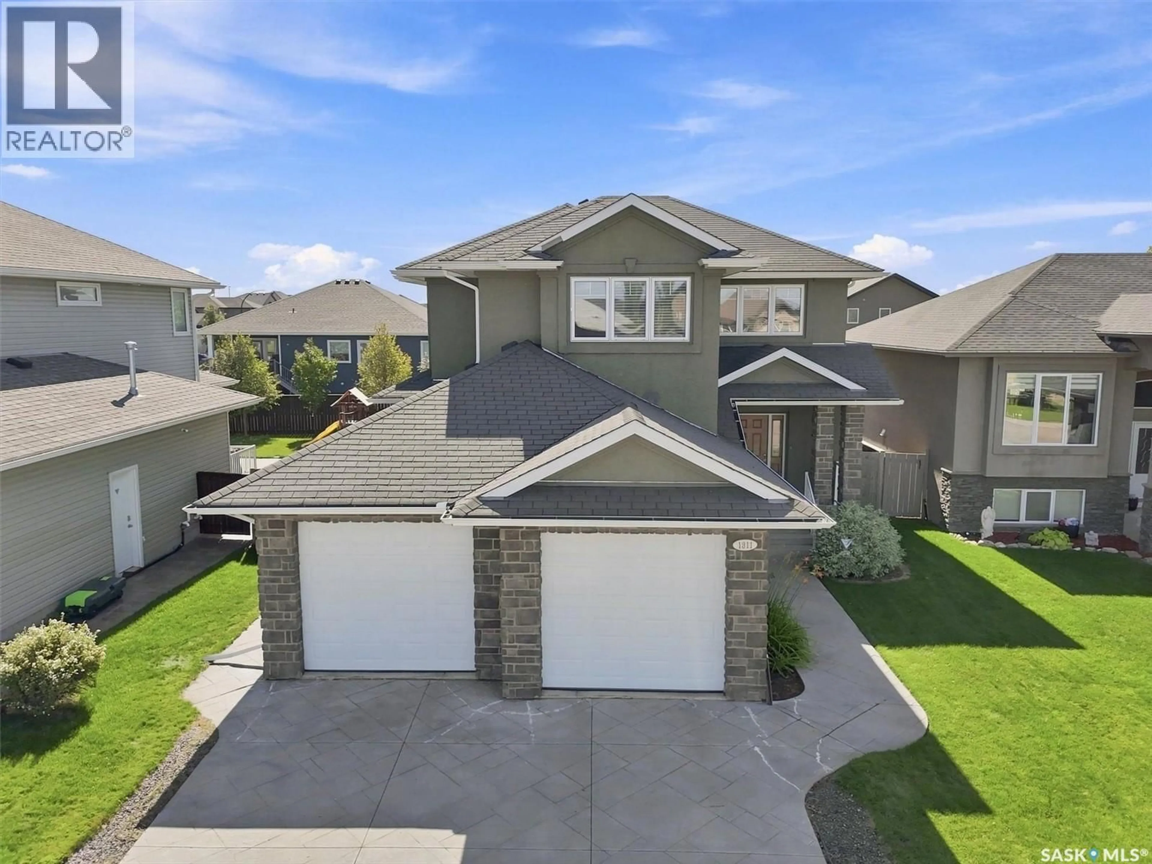 A pic from outside/outdoor area/front of a property/back of a property/a pic from drone, street for 1311 SHEPHERD CRESCENT, Saskatoon Saskatchewan S7W0B6