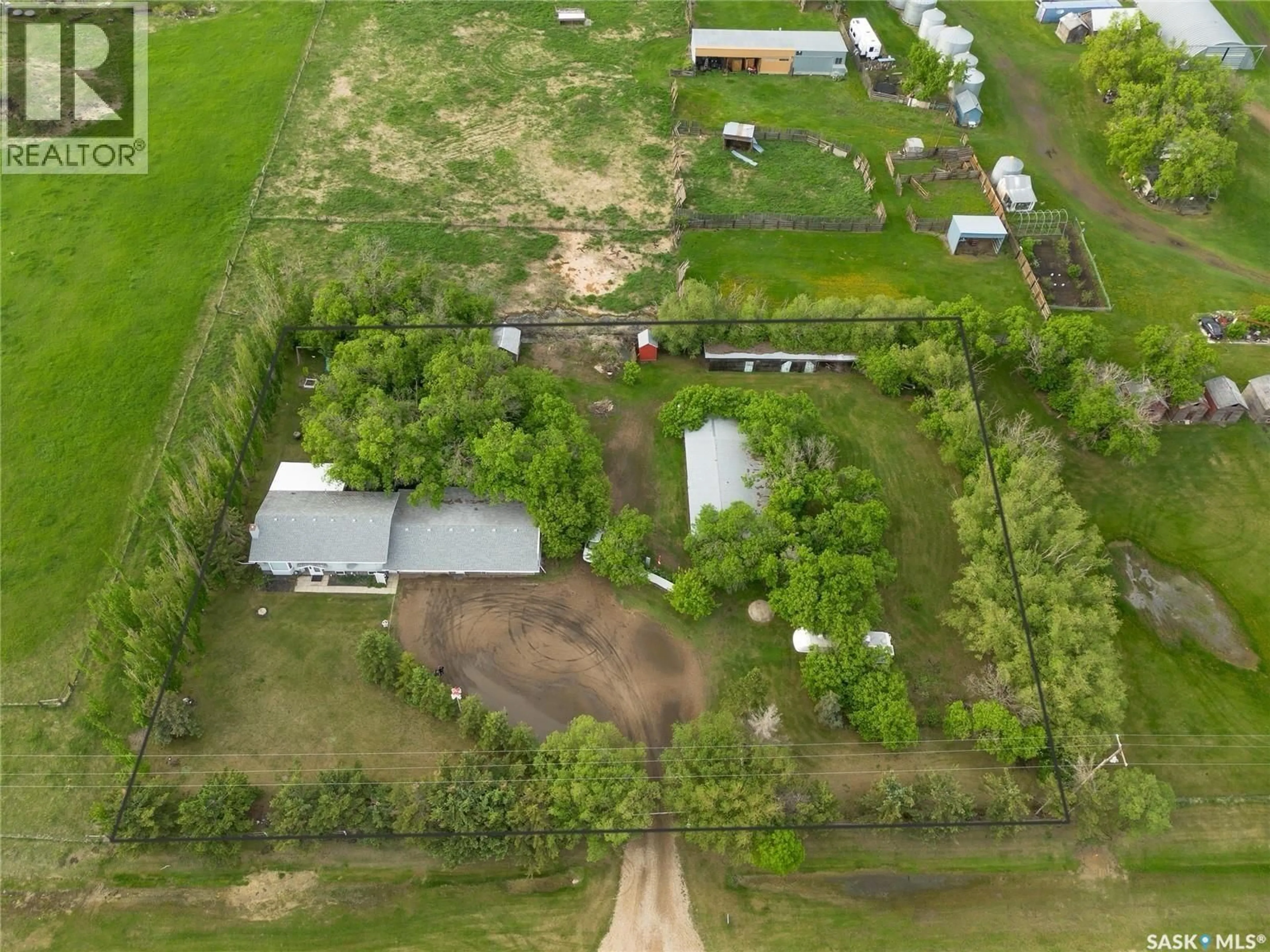 A pic from outside/outdoor area/front of a property/back of a property/a pic from drone, street for ROSTHERN ACREAGE, Rosthern Rm No. 403 Saskatchewan S0K3R0