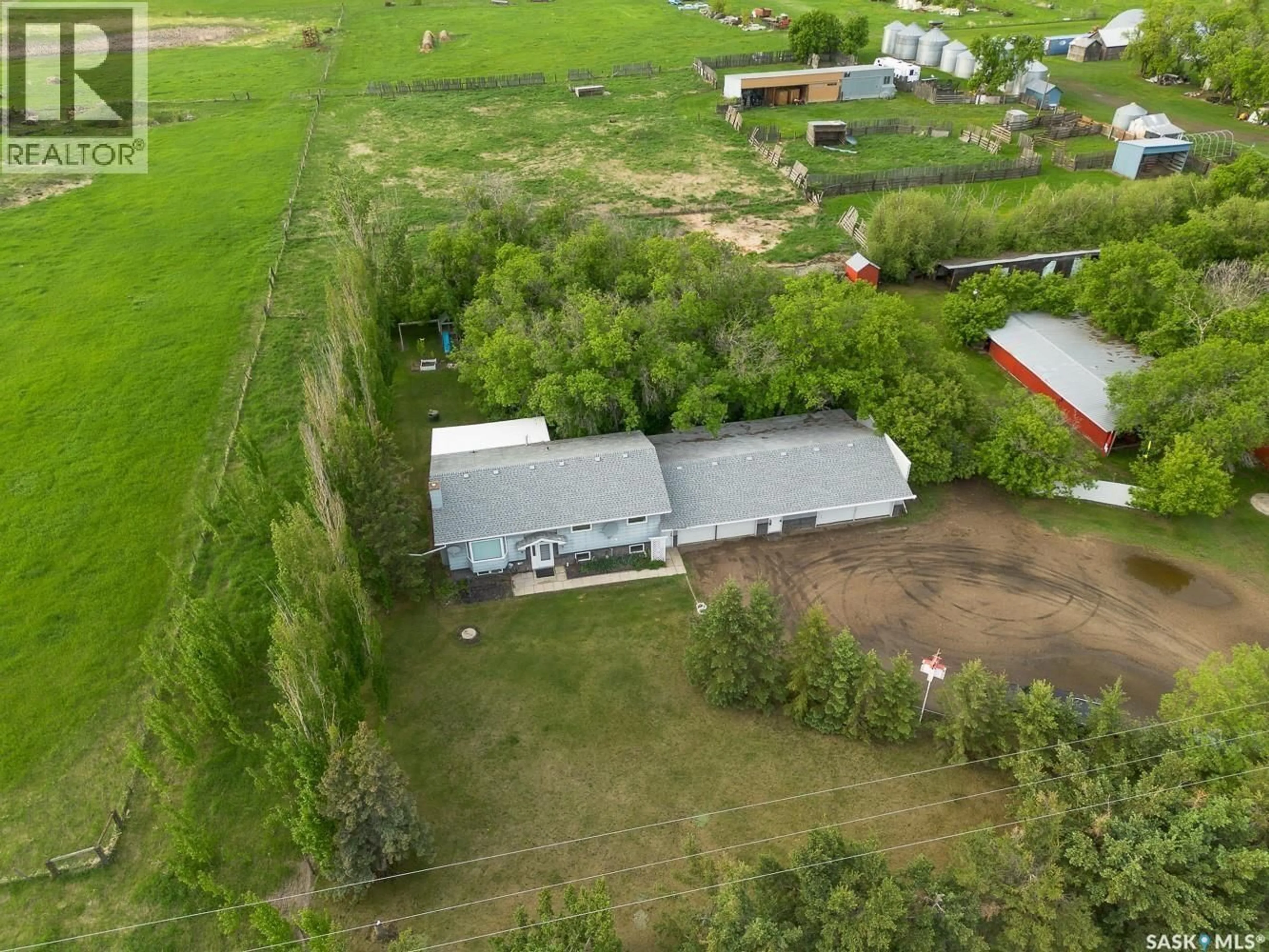 A pic from outside/outdoor area/front of a property/back of a property/a pic from drone, building for ROSTHERN ACREAGE, Rosthern Rm No. 403 Saskatchewan S0K3R0