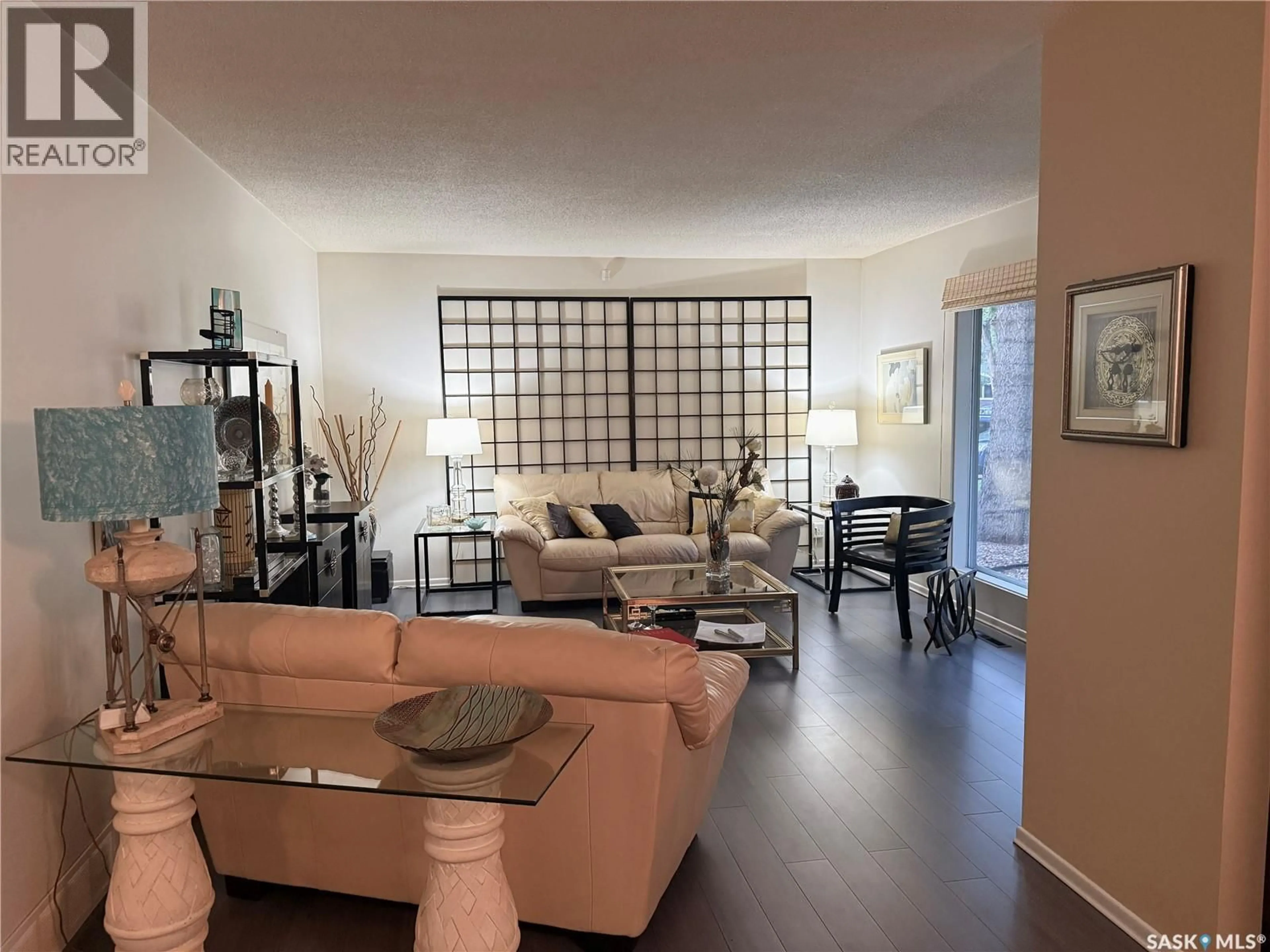Living room with furniture, unknown for 42 SPINKS DRIVE, Saskatoon Saskatchewan S7H4B8