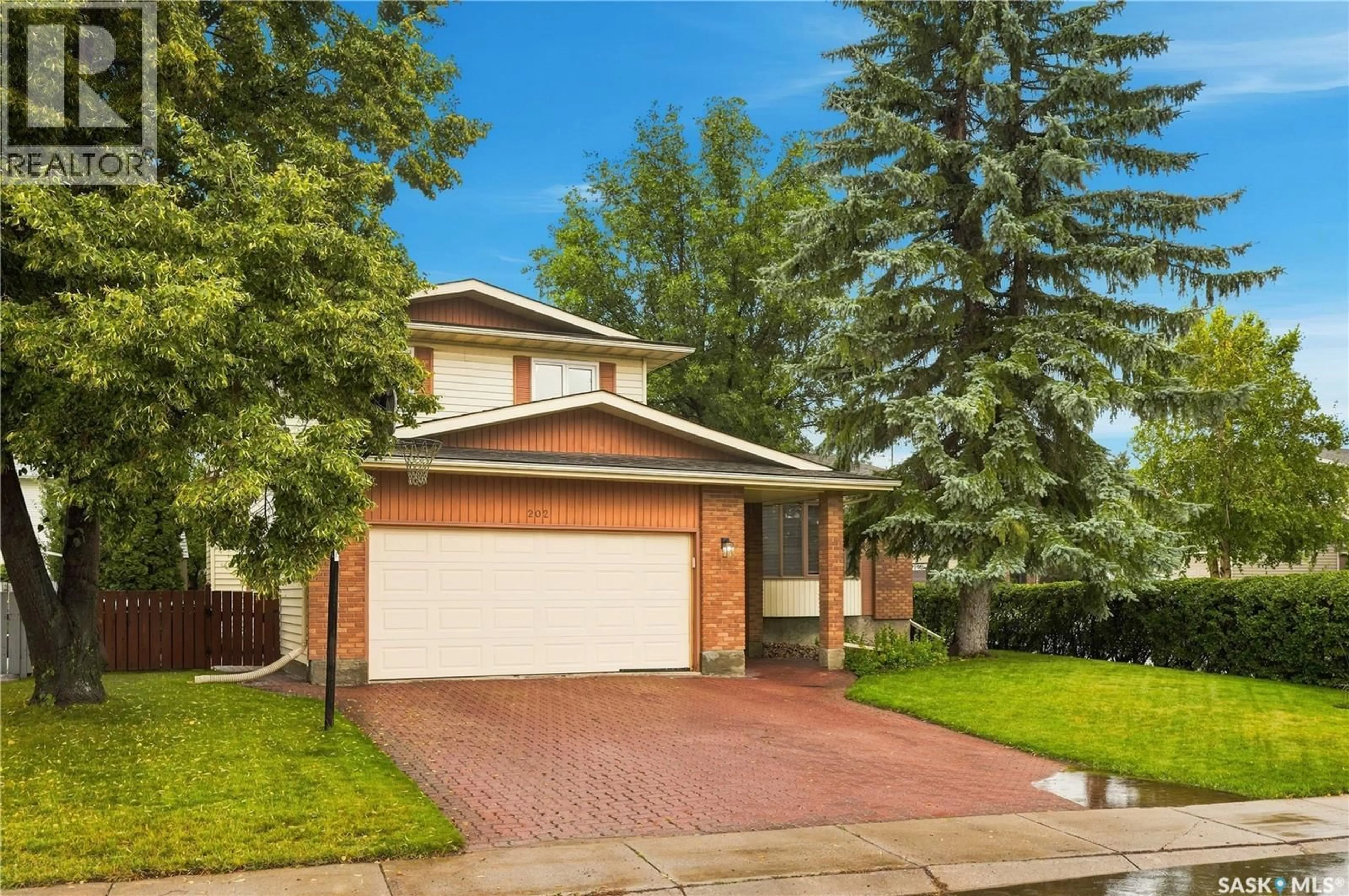 Home with brick exterior material, street for 202 ZEMAN COURT, Saskatoon Saskatchewan S7K7W5