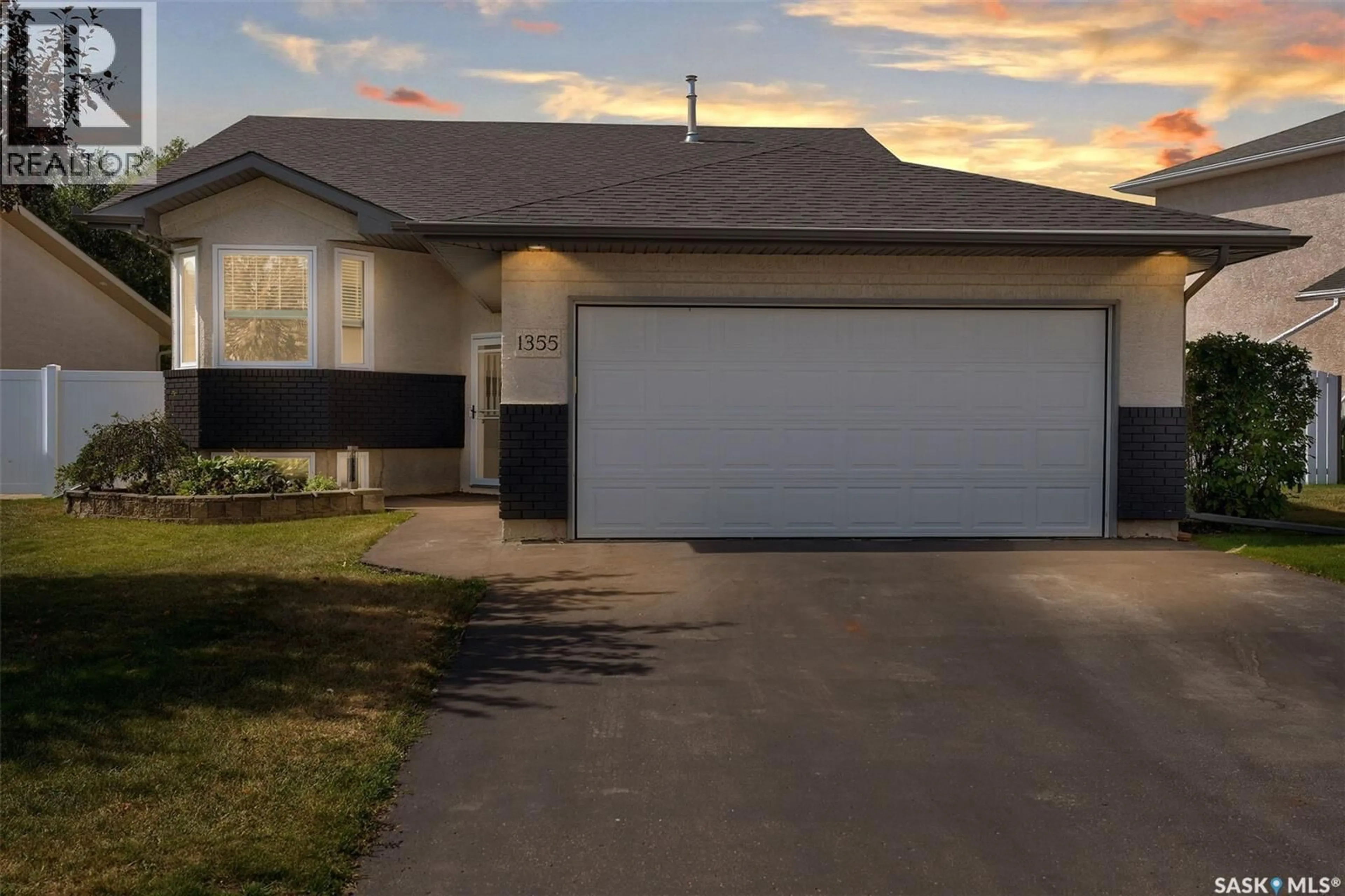 Home with vinyl exterior material, street for 1355 MAPLE LEAF CRESCENT, Regina Saskatchewan S4X4J4