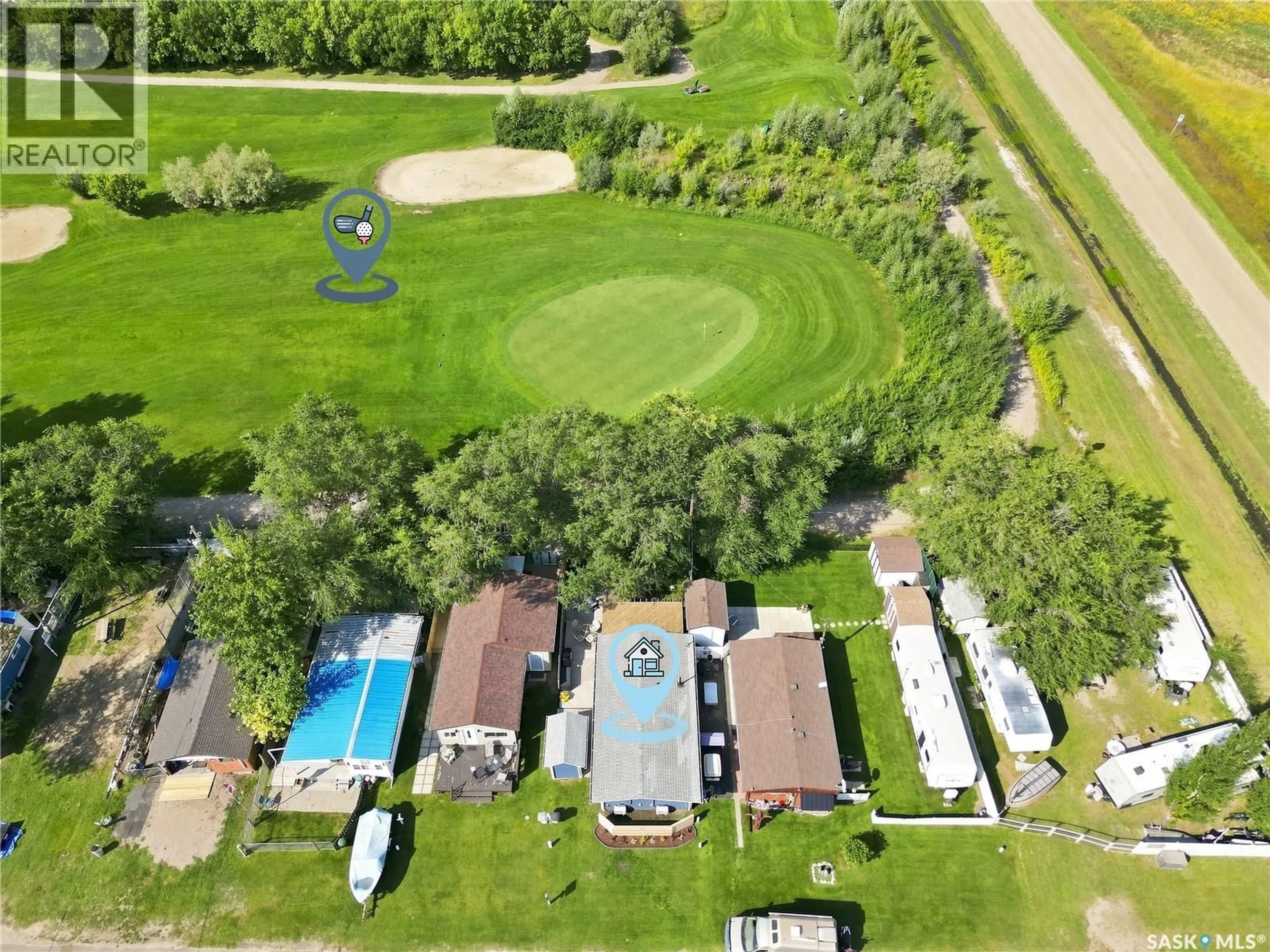 A pic from outside/outdoor area/front of a property/back of a property/a pic from drone, water/lake/river/ocean view for 22 BEACH AVENUE, Aquadeo Saskatchewan S0M0L0
