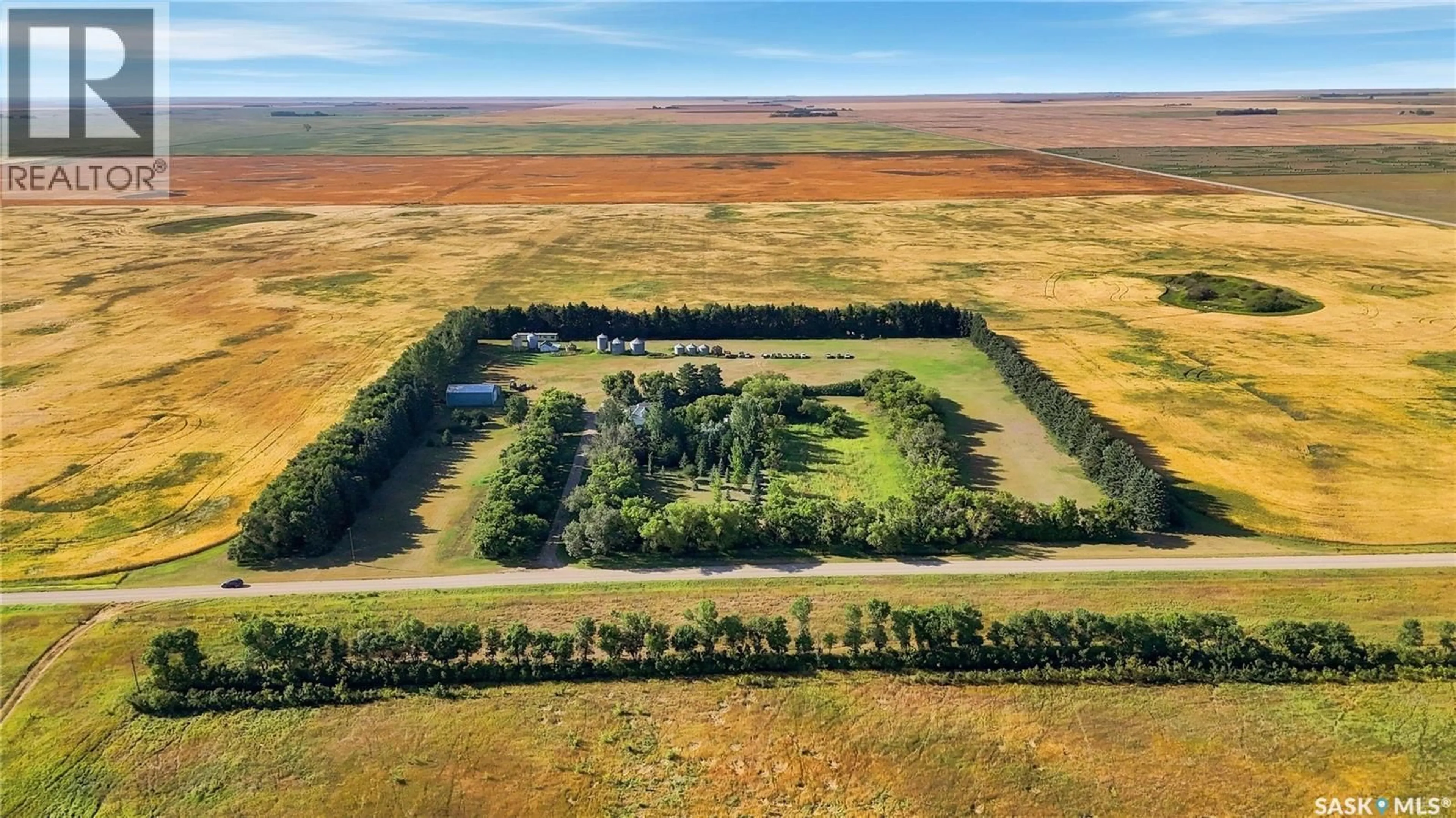 A pic from outside/outdoor area/front of a property/back of a property/a pic from drone, water/lake/river/ocean view for DUNNING ACREAGE, Pense Rm No. 160 Saskatchewan S0G3W0
