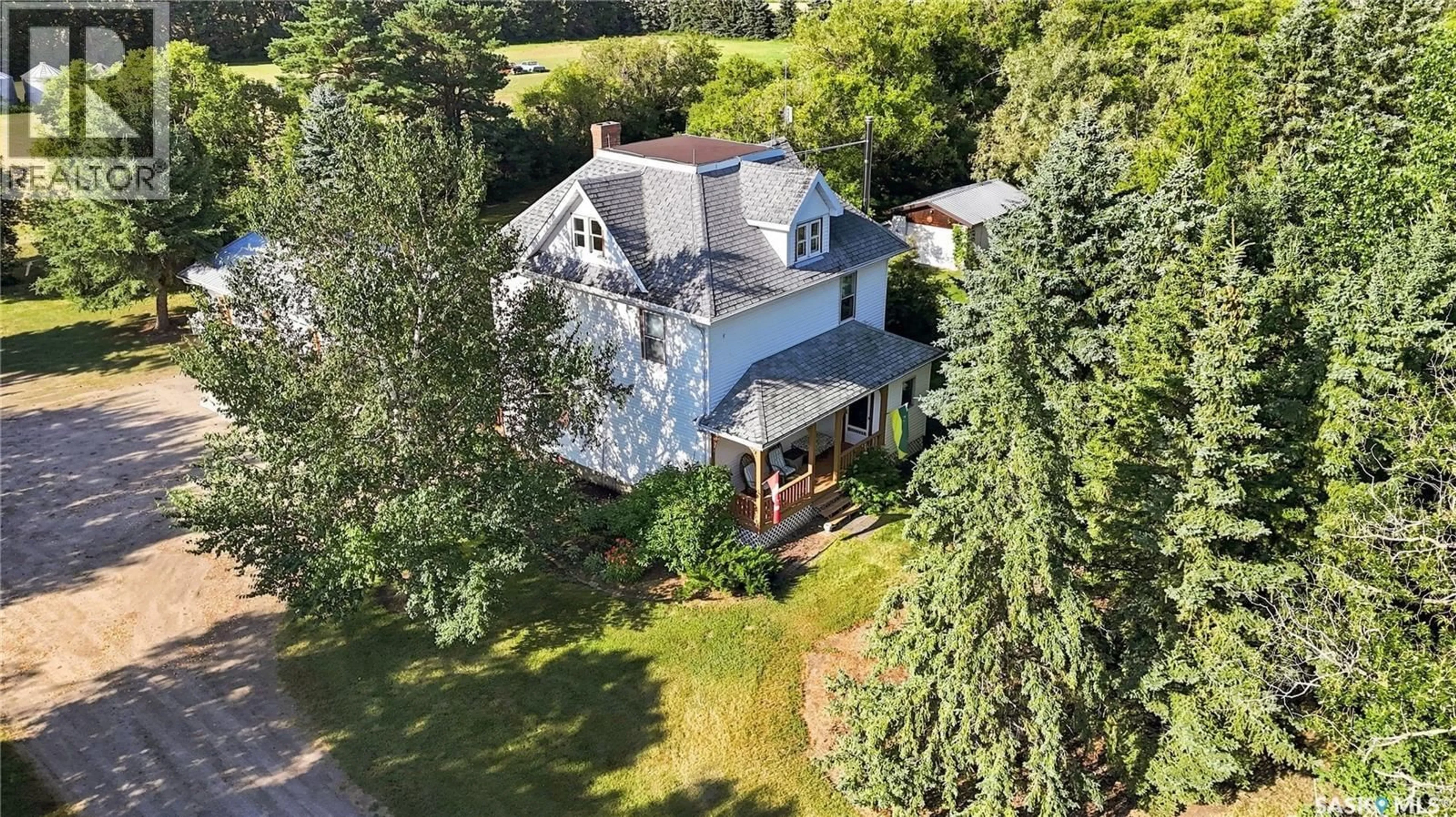 A pic from outside/outdoor area/front of a property/back of a property/a pic from drone, street for DUNNING ACREAGE, Pense Rm No. 160 Saskatchewan S0G3W0