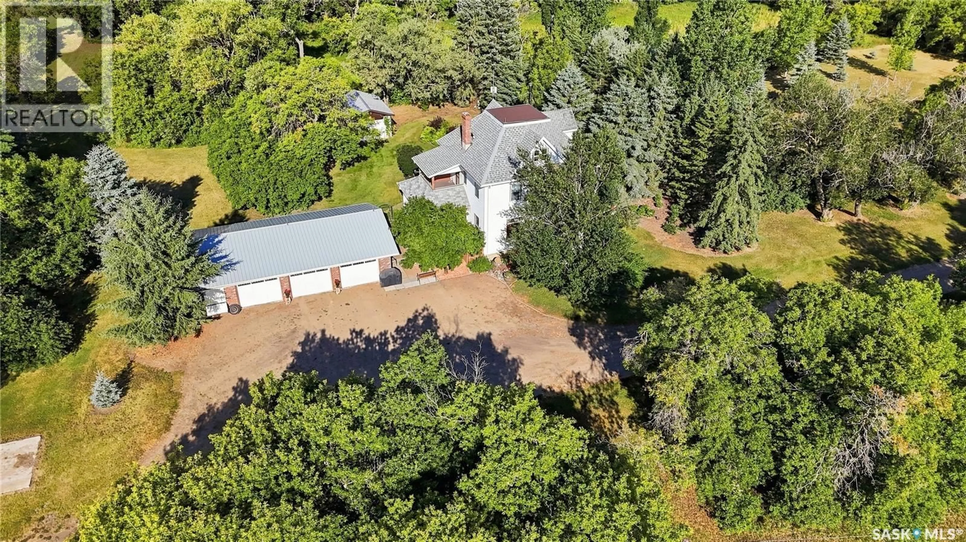 A pic from outside/outdoor area/front of a property/back of a property/a pic from drone, unknown for DUNNING ACREAGE, Pense Rm No. 160 Saskatchewan S0G3W0